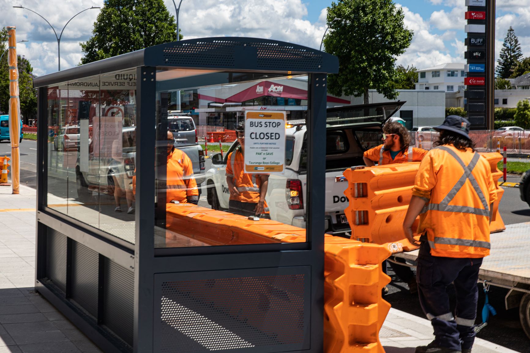 Road safety barriers being erected around the temporary bus stop between 11th and 12th Avenue on Cameron Rd. Photo / Mead Norton