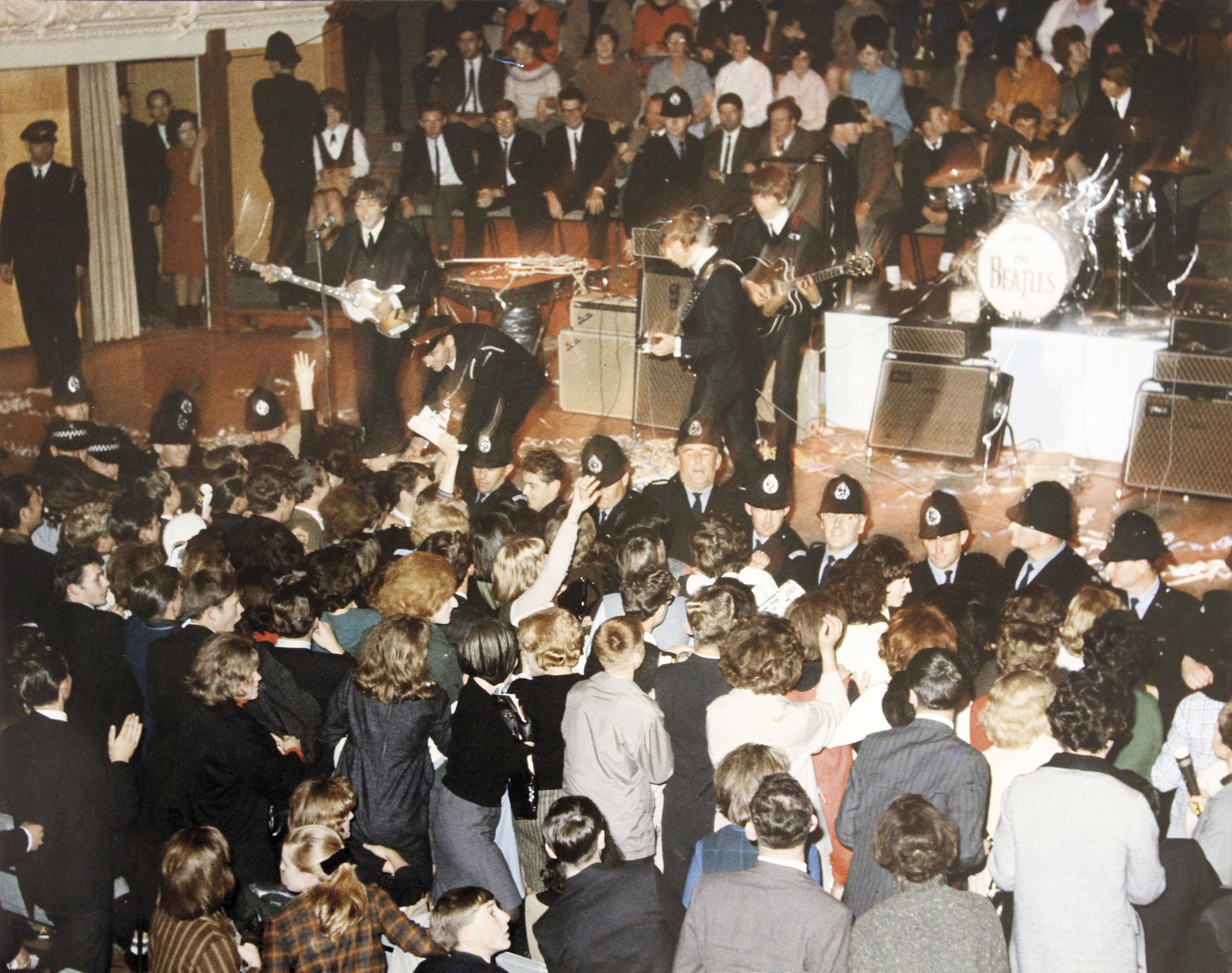 Thin blue line: Police hold firm as fans crush towards the stage at the Auckland Town Hall. Photo / When We Was Fab: Inside The Beatles Australasian Tour 1964.