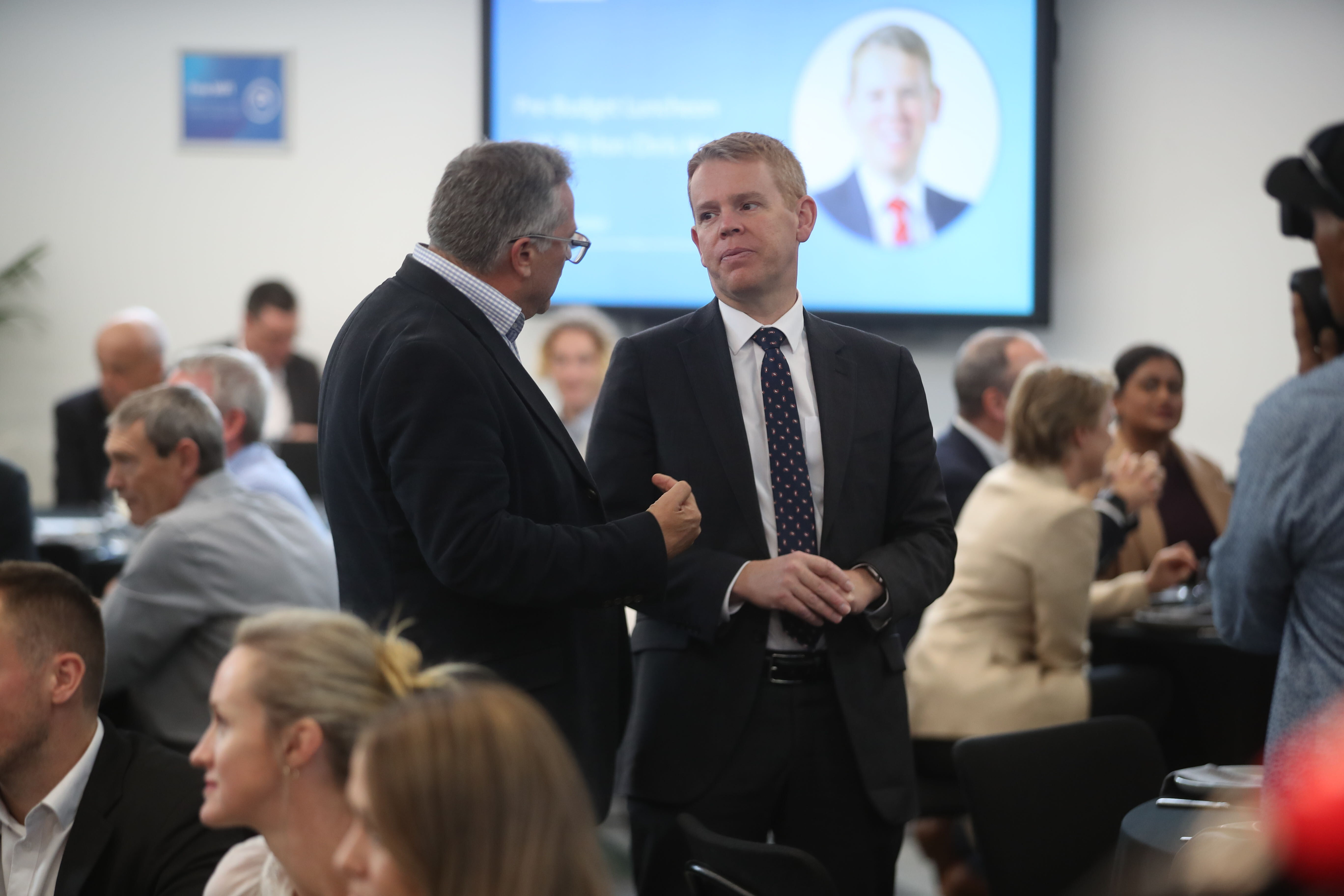 Prime Minister Chris Hipkins in conversation before his pre-Budget speech in Auckland on Thursday. Photo / Jason Oxenham