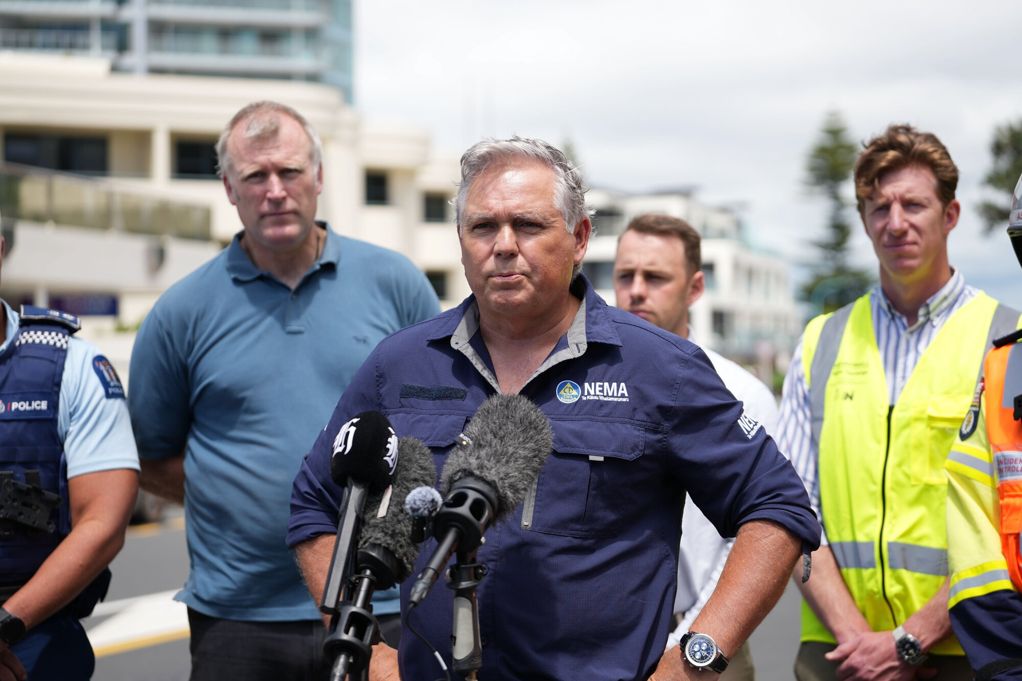 Emergency Management Minister Mark Mitchell holds a stand up at Mount Maunganui Beachside Holiday Park in Mount Maunganui following a major landslide. Photo / Alyse Wright