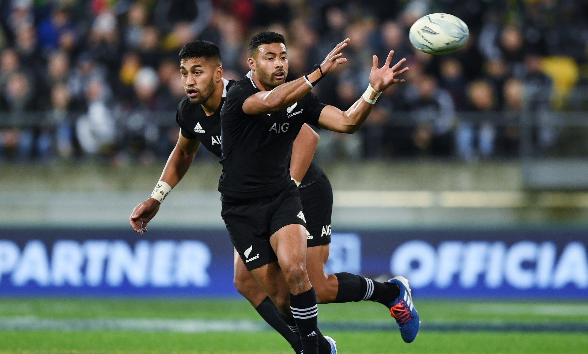 Richie Mo'unga (front) and Reiko Ioane take on South Africa, in Wellington. Photo / Photosport