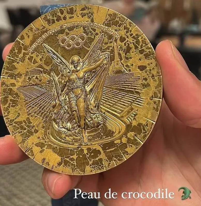 France’s Clément Secchi was not happy with the state of his Paris 2024 bronze medal, describing its exterior as 'crocodile skin'. Photo / Instagram