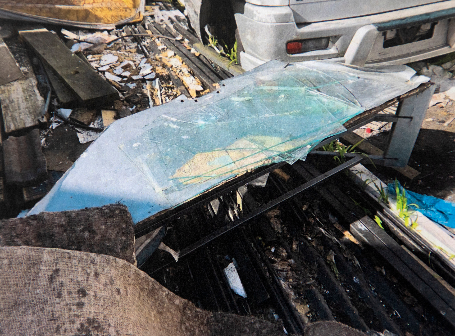 Rubbish dumped outside the flats.