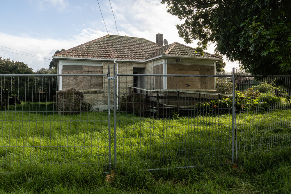 An abandoned houses on Wainwright Ave, Mt Roskill. Photograph / Jason Dorday