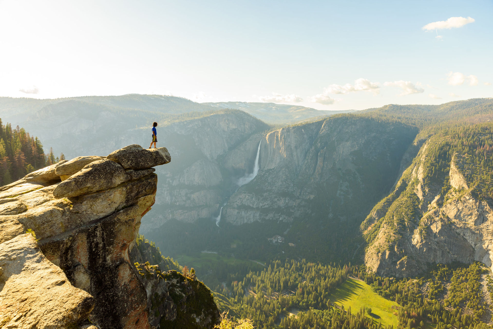 Hiker at the Glacier Point with View to Yosemite Falls and Valley in the Yosemite National Park, California. Photo / 123RF