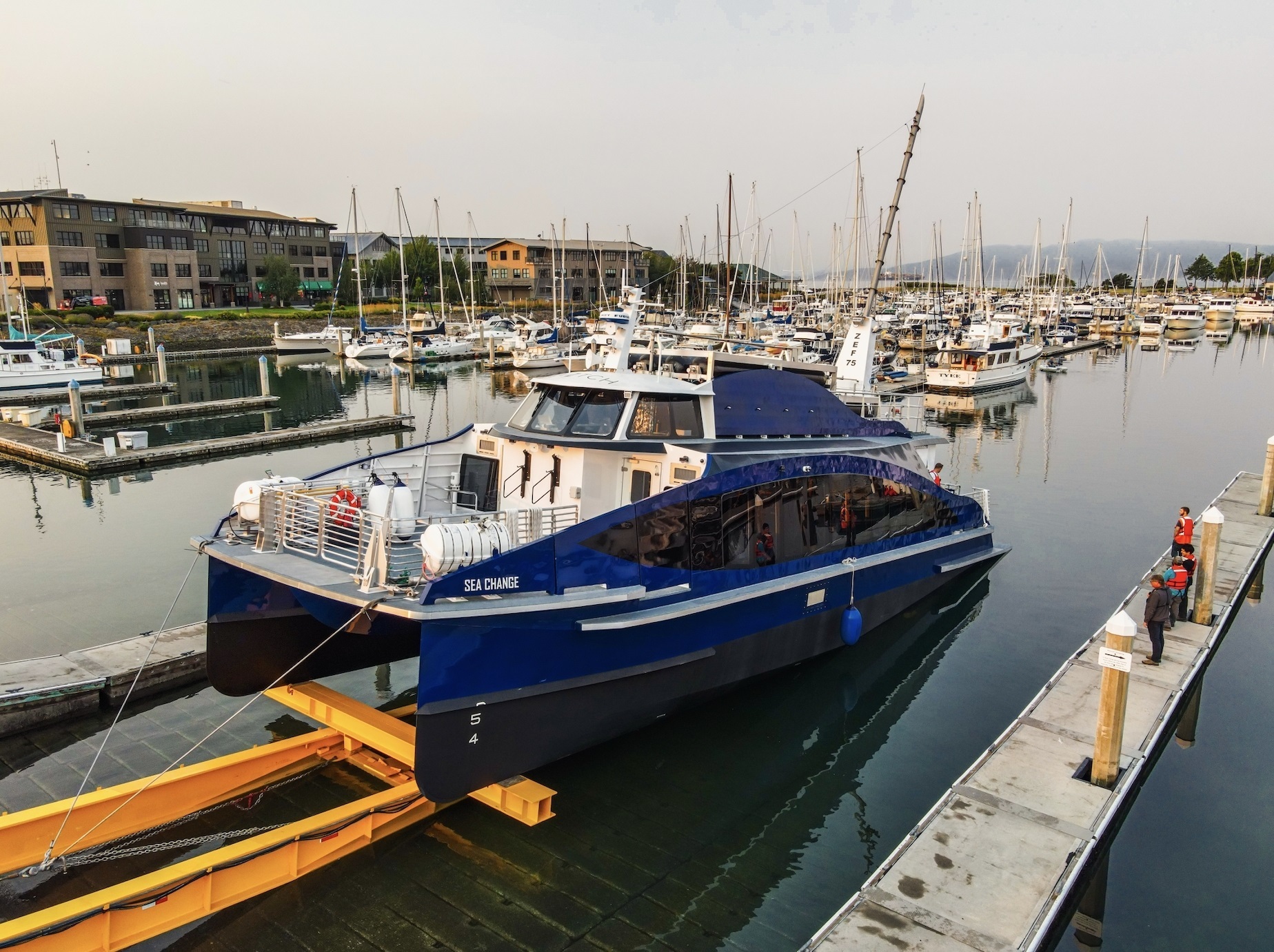 A team from Fullers has just returned from a fact-finding tour, which included a meeting in Seattle with the makers of the 75-passenger Sea Change - the world's first fully hydrogen-powered ferry (pictured at its launch in September 2021). The Sea Change has managed just 13 knots (it's designed for 20) and takes eight hours to refuel, but has a range of 500km - or about 10 times the first pure electric ferries. Photo / AP