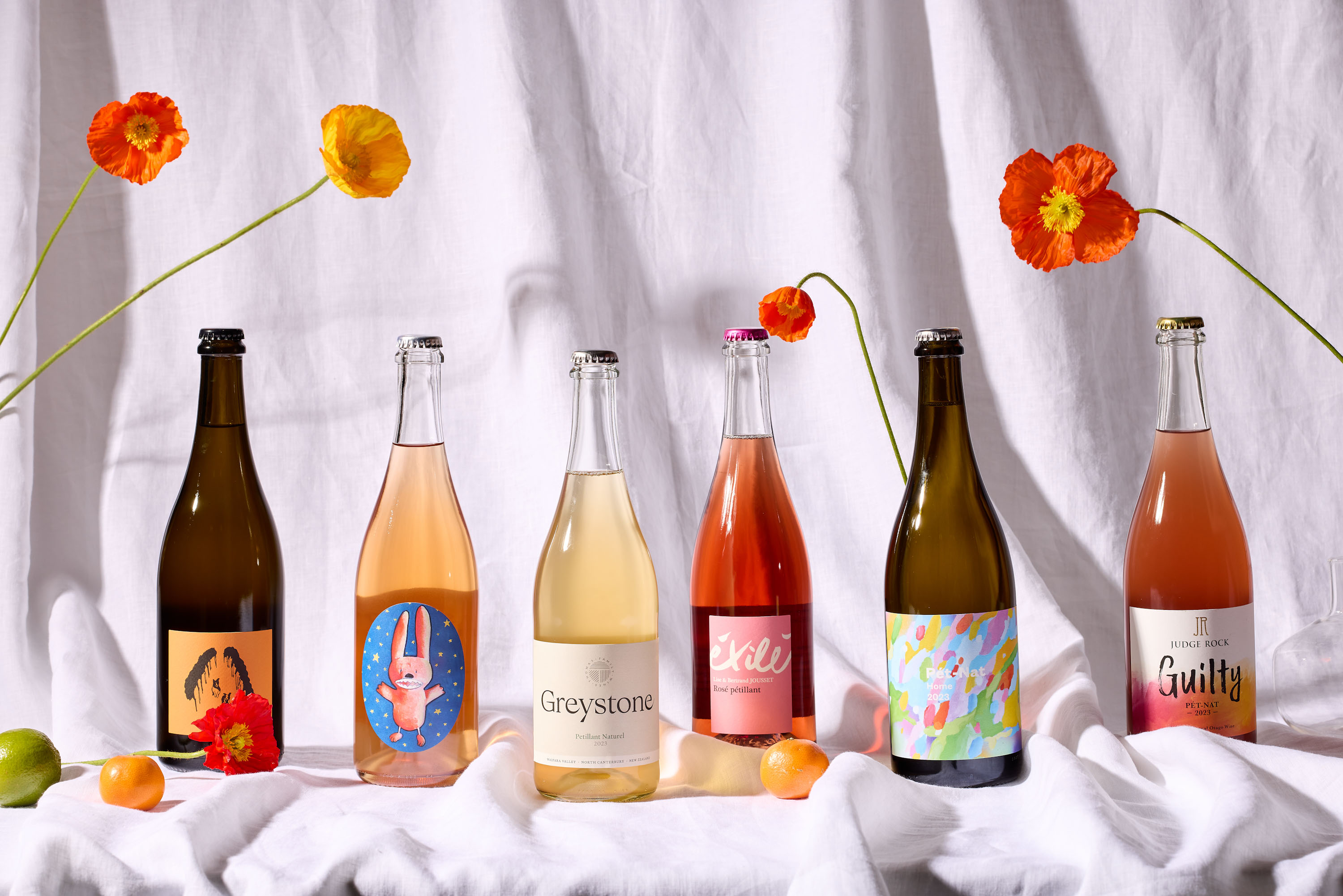 From left: Marathon Downs Racecourse Block Marlborough Sauvignon Blanc Petillant Naturel 2023; Wild Man Astro; Bunny Pet Nat, Australia 2021; Greystone North Canterbury Petillant Naturel 2023; Lise & Bertrand Jousset Exilé Rosé Petillant Vin de France 202; Black Estate Home North Canterbury Pet-Nat 202; Judge Rock Guilty Central Otago Pet Nat 2023. Photo / Babiche Martens 