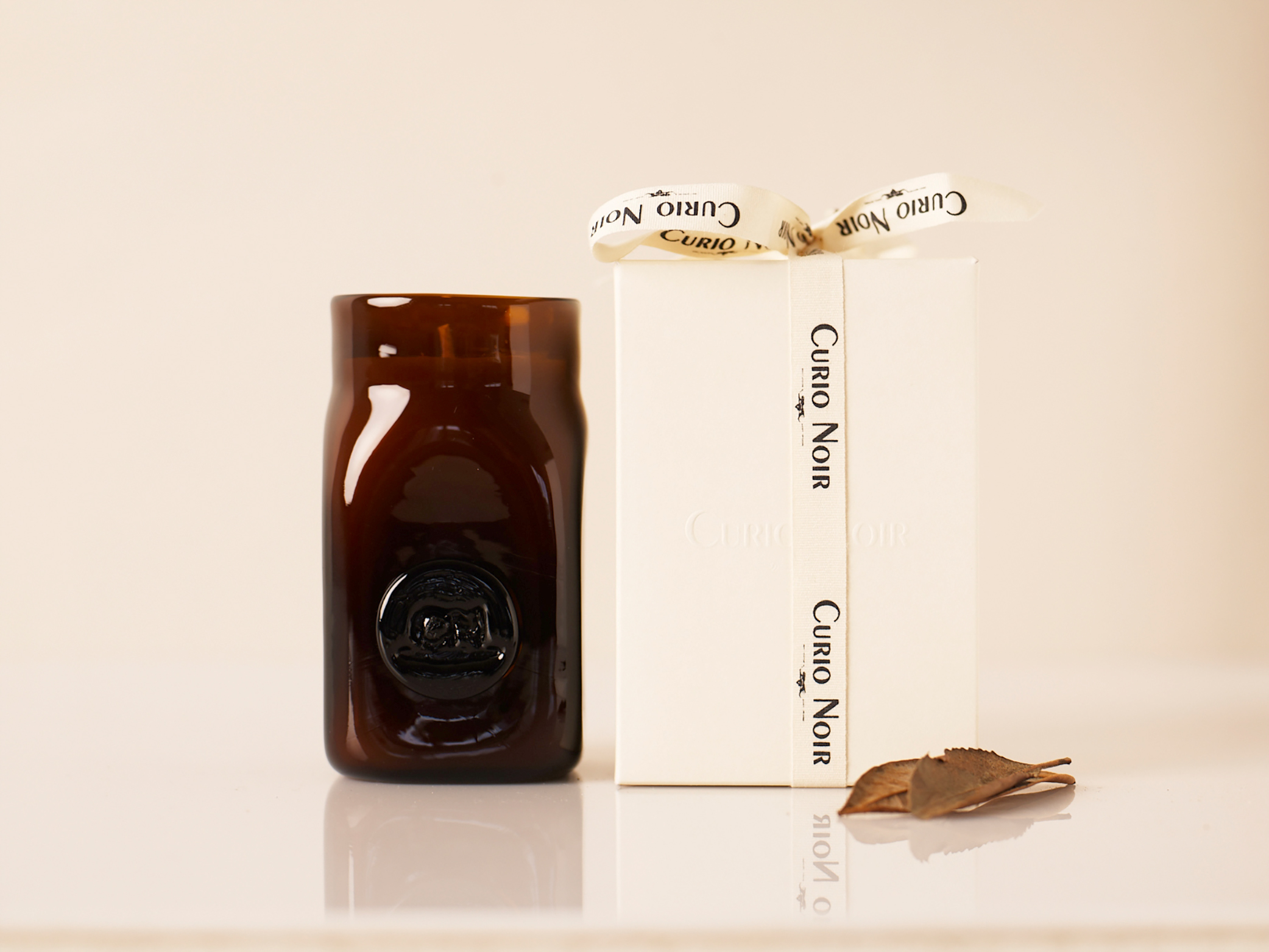 Curio Noir's candles come in come in hand-shaped glass vessels which can be later used as vases. Picture / Supplied