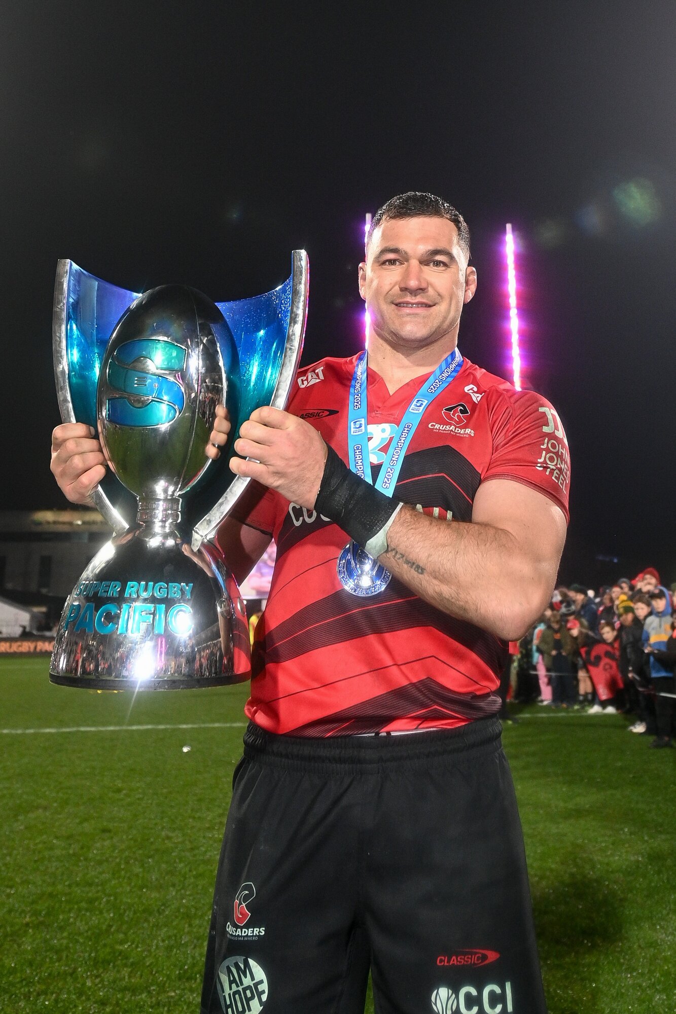 Crusaders captain David Havili celebrates after winning the 2025 Super Rugby final. Photo / Photosport