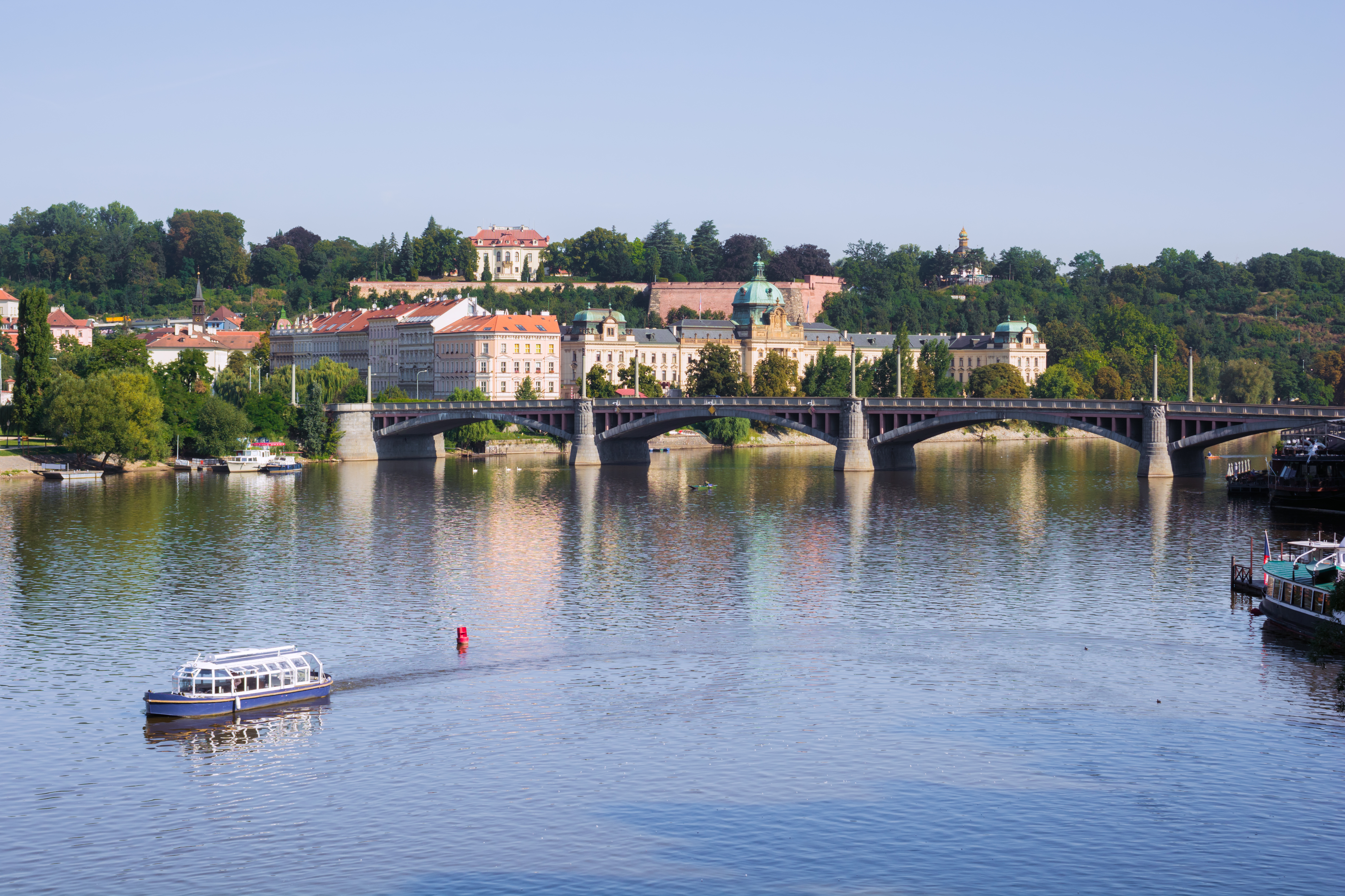Cross the Vltava River in Prague via Mánes Bridge. Photo / Getty Images
