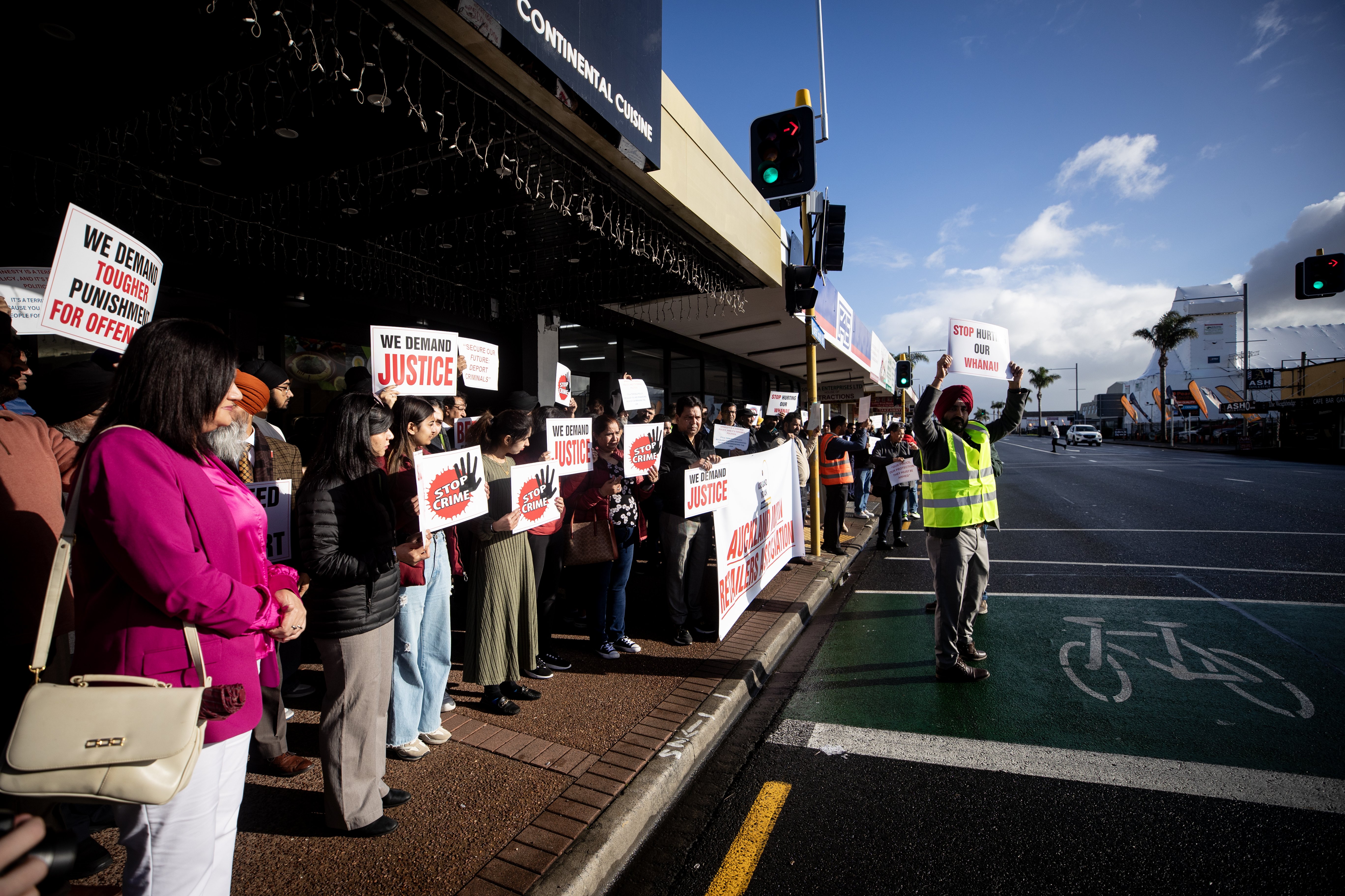About 200 business owners and supporters staged a protest in Papatoetoe on Tuesday. Photo / Dean Purcell