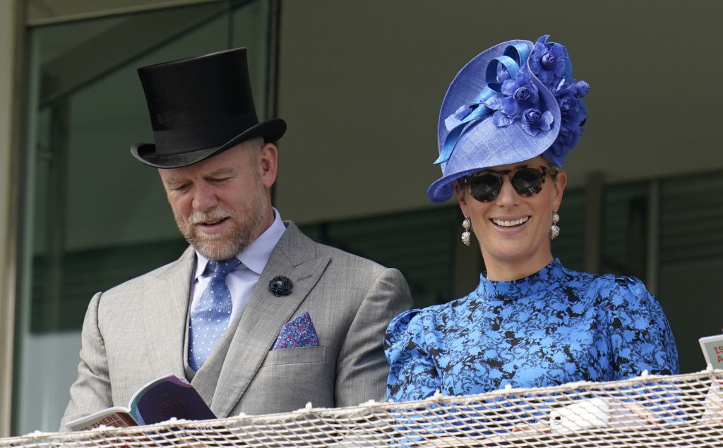 Mike and Zara Tindall in the stands on Derby Day at Epsom Racecourse. The Queen was unable to attend but was watching from the couch according to Zara. Photo / Getty