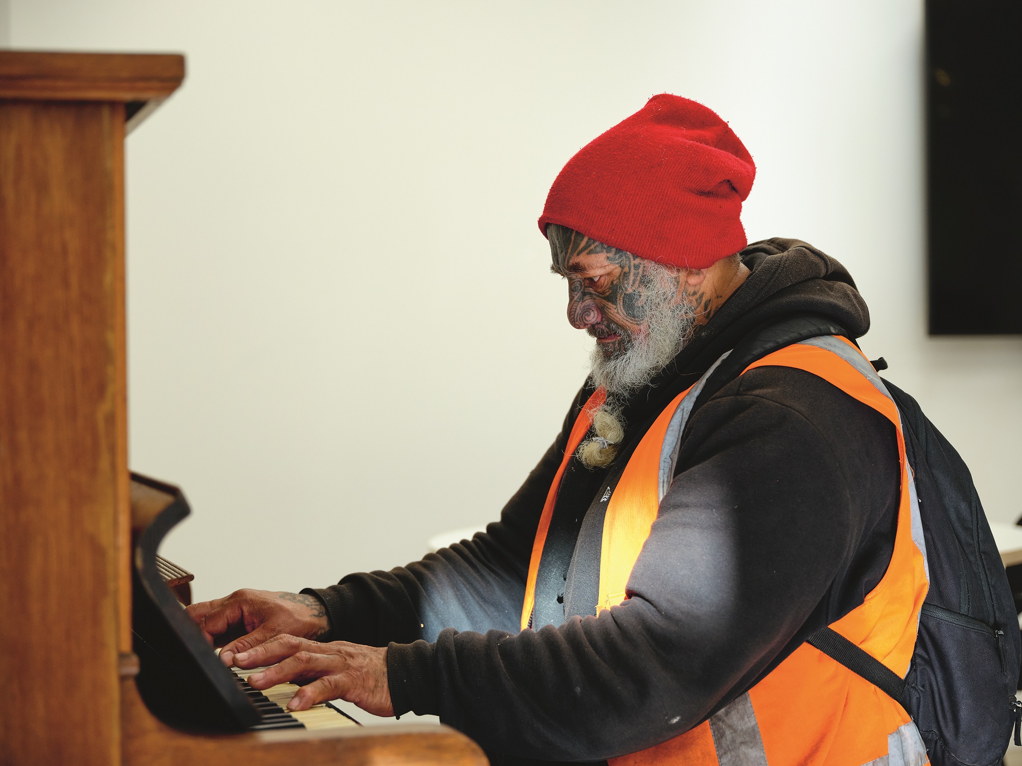 Regular HomeGround visitor Cookie, at the piano in the Haeata dining room. Photo / Mark Smith