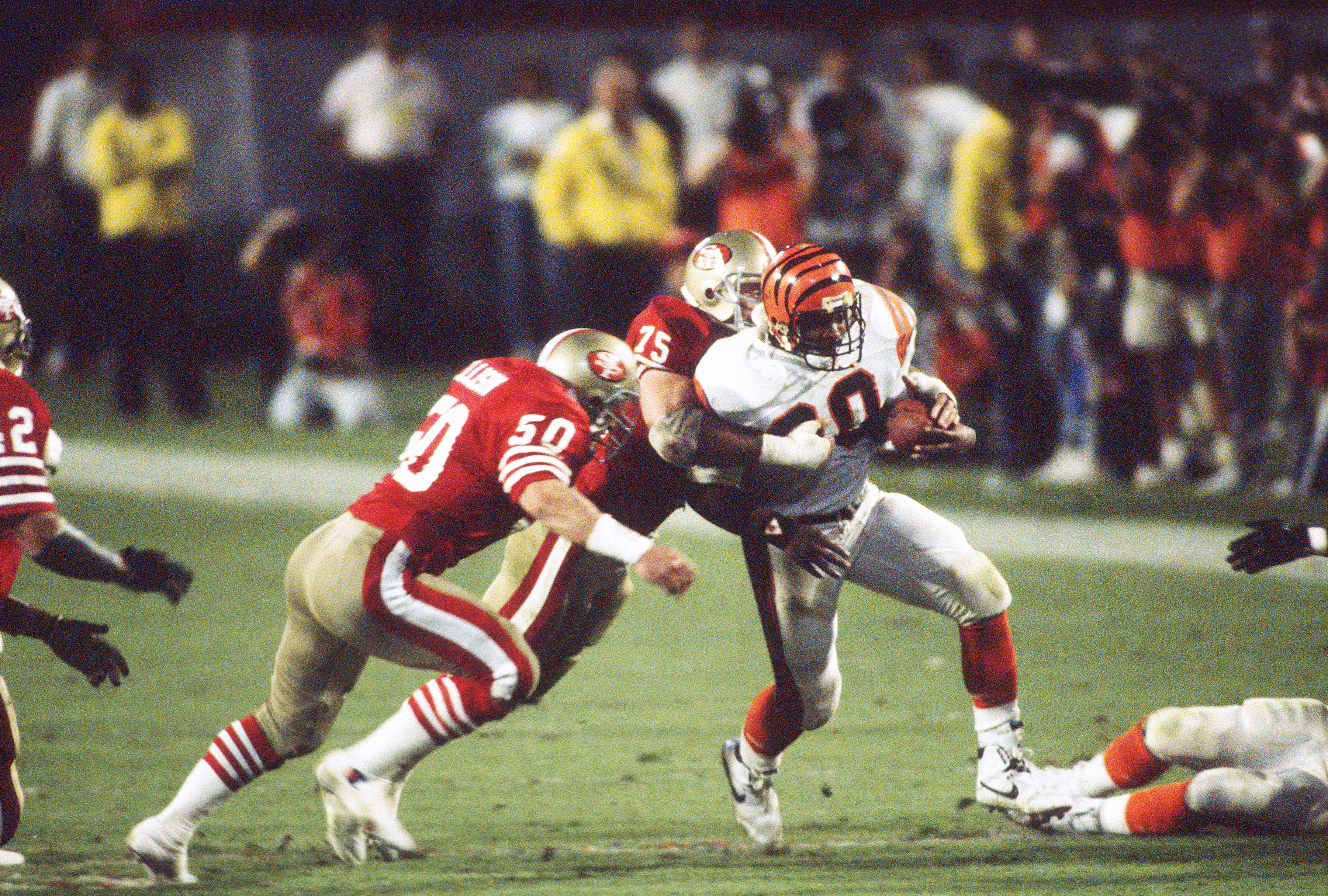 Riki Ellison (50) prepared to tackle Cincinnati Bengals running back Ickey Woods during Super Bowl XXIII. Photo / Getty Images