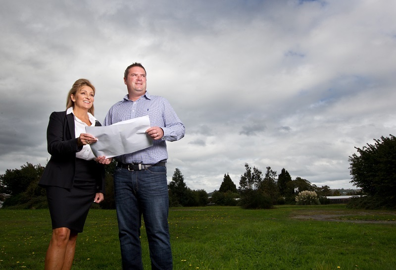 Beth Millard, from Bayleys, and Holmes Group's Ryan Holmes at the site where Ashworth Villas will be built if resource consent is granted. Photo / File