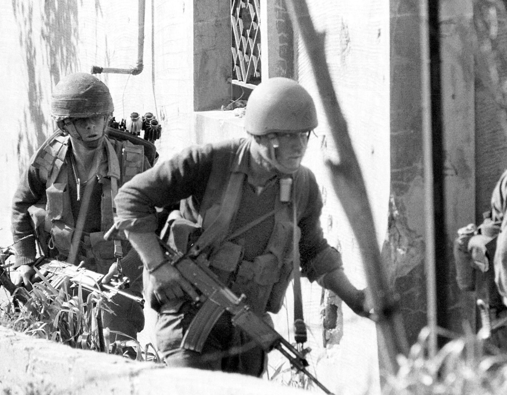 Israeli troops enter a Lebanese village during the first invasion of the country, in 1978. Photo / Uzi Keren, AFP