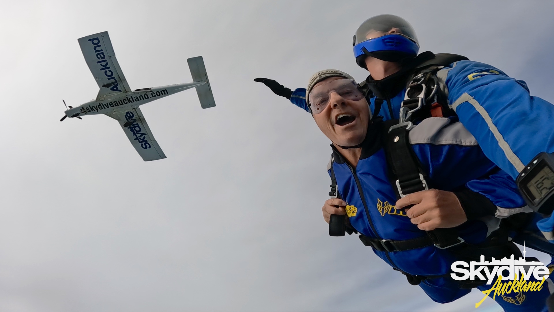 National's Andrew Bayly jumps out of a plane as part of the Cancer Society’s ‘Toss Your Boss’ campaign. Photo / Supplied