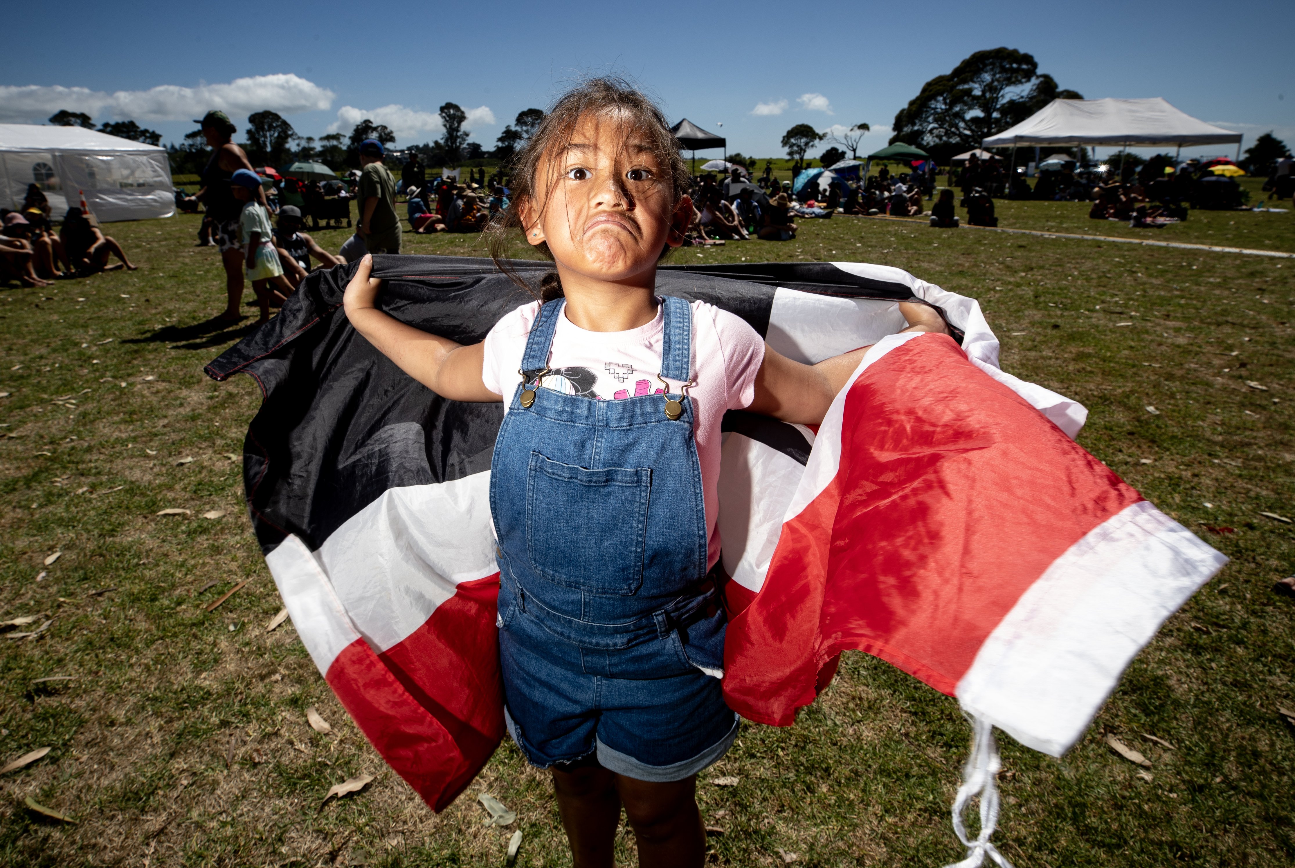 Catana Wallace (6) from Ōtara attends the Waitangi Day free event held at Point England Reserve in Glen Innes. Photo / Dean Purcell