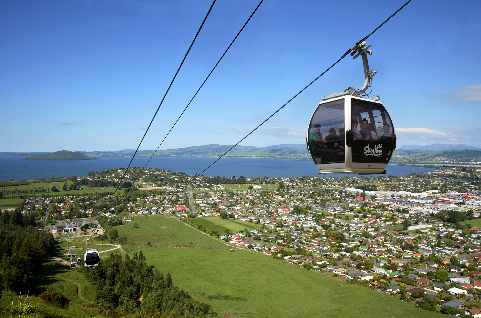 Admire the striking views of Lake Rotorua from your gondola cabin at Skyline Rotorua. Photo / Destination Rotorua