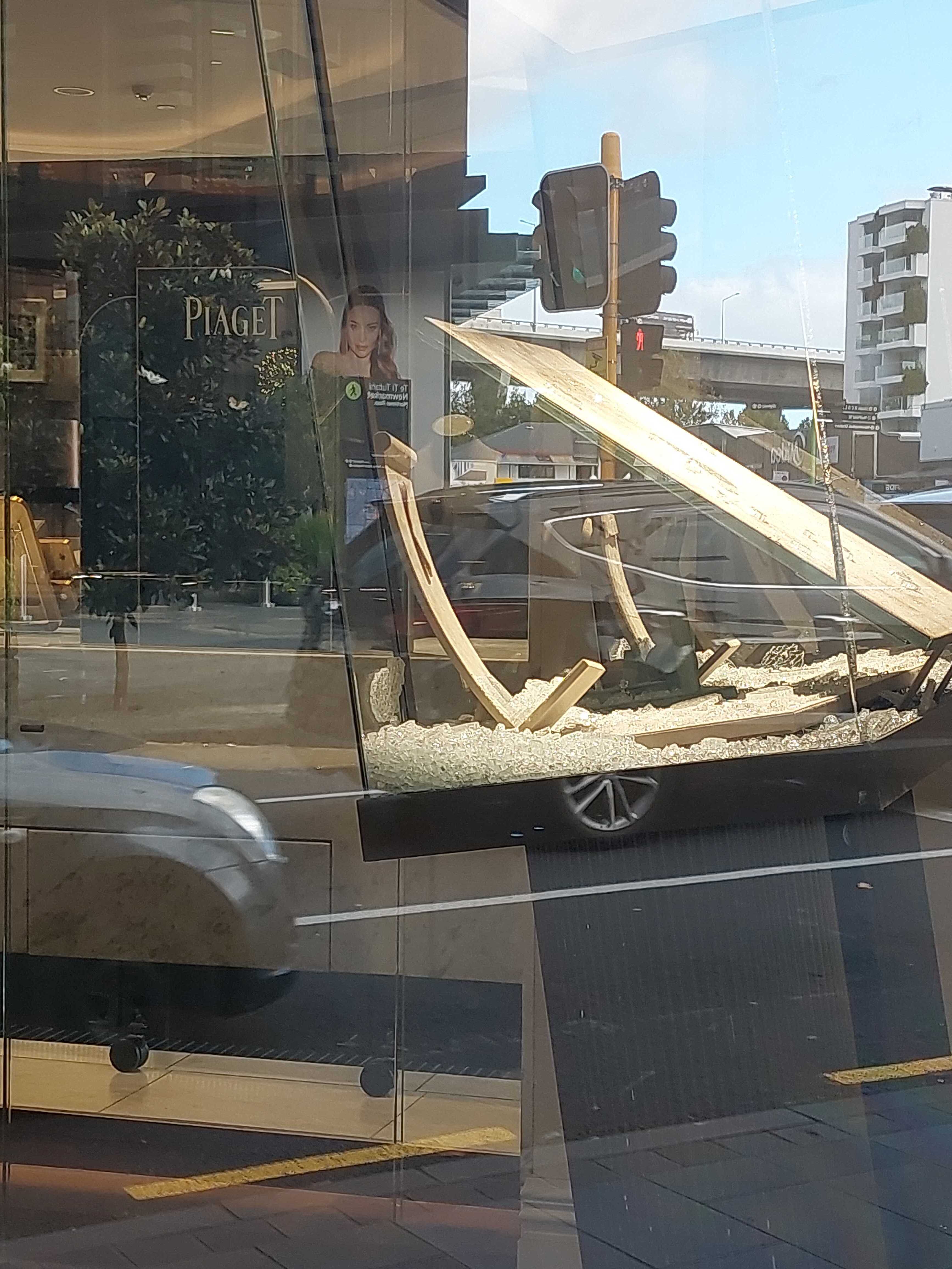 Broken glass cabinets could be seen from the entrance of Partridge Jewellers in Newmarket Mall, Auckland.