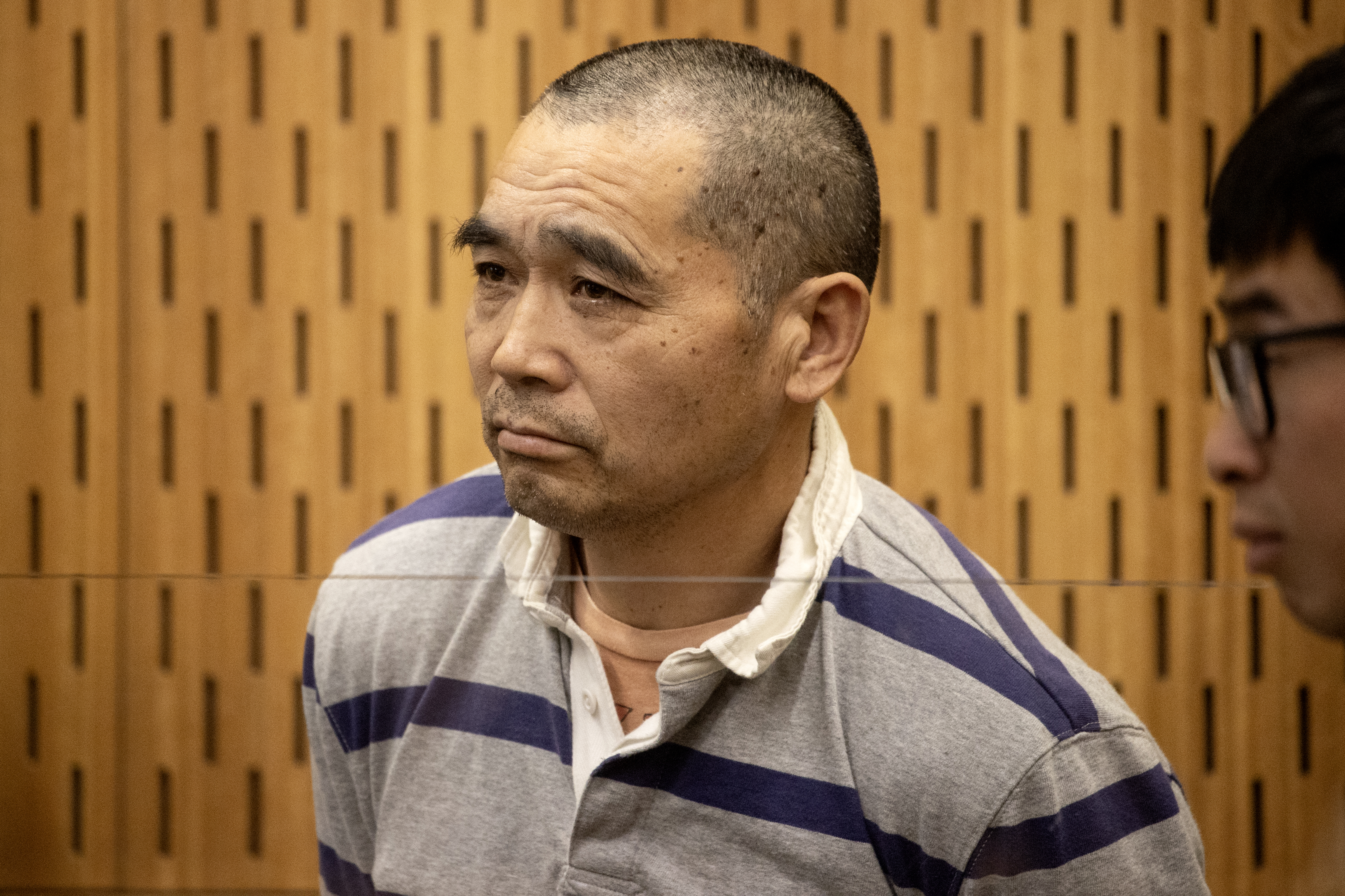 Tingjun Cao is charged with murdering Yanfei Bao on July 19. Photo / George Heard.
