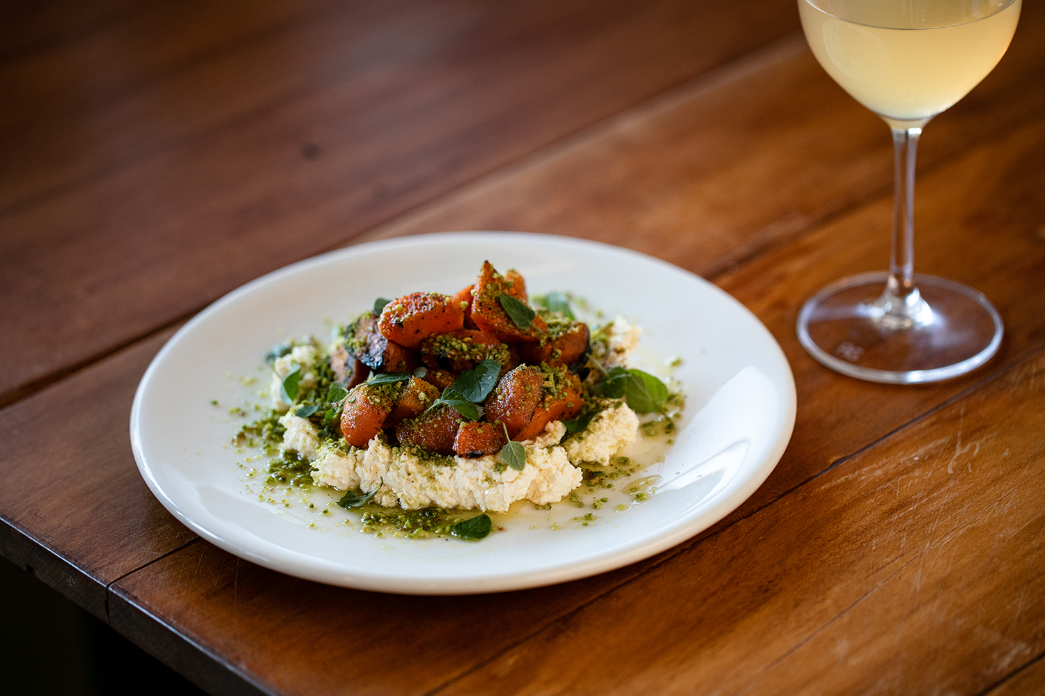 The wood-fired carrots with whipped ricotta and pistachios. Photo / Babiche Martens