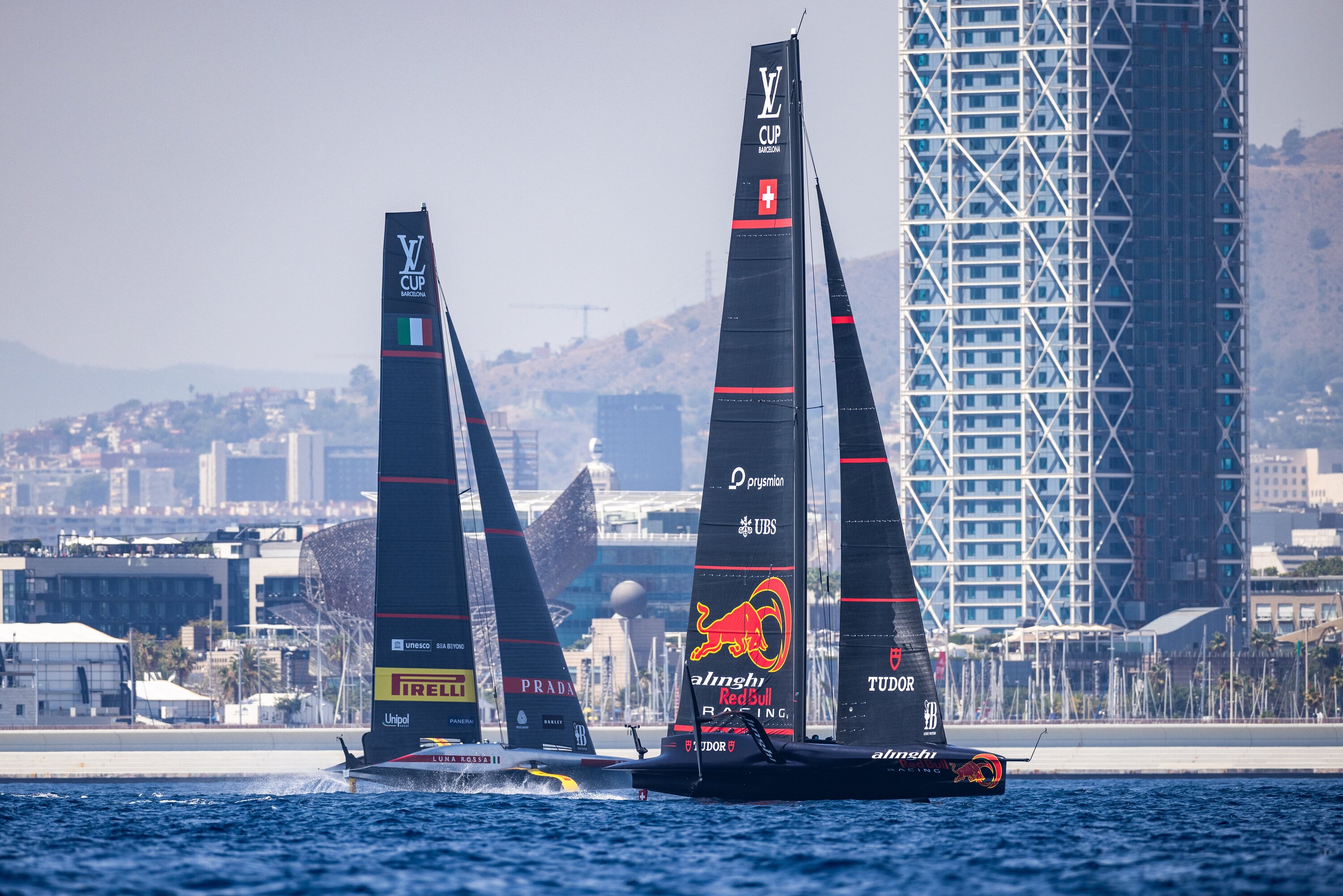 Luna Rossa Prada Pirelli and Alinghi Red Bull in pre-regatta racing off the coast of Barcelona in early August. Photo / Samo Vidic