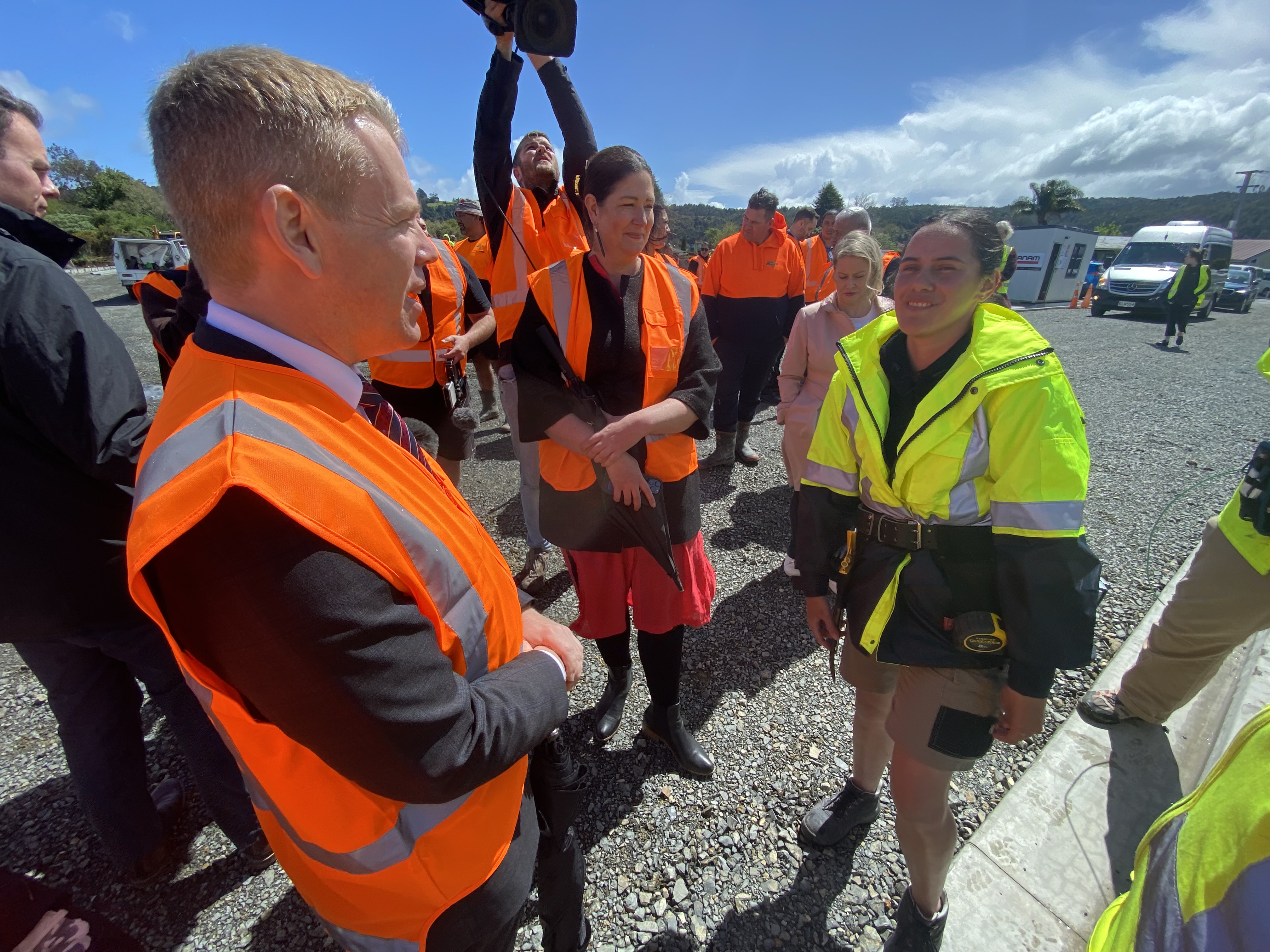Labour leader Chris Hipkins in Northland, meeting apprentice builder Juan Brown. Northland MP Willow Jean Prime is pictured at centre. Photo / David Fisher