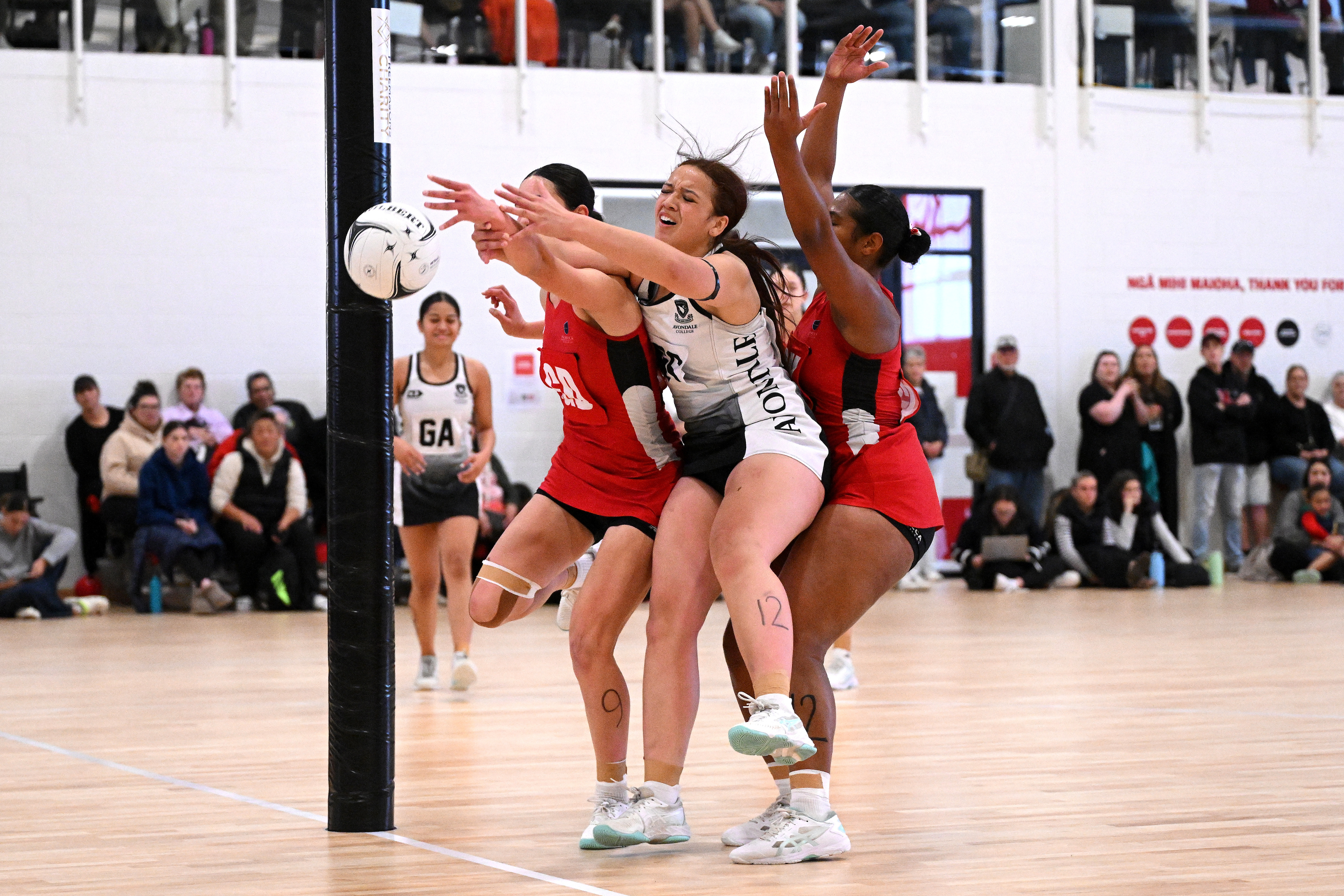 Avondale College captain Priscilla Rasmussen feels the squeeze of the Howick defensive circle. Photo / Joe Allison, Michael Bradley Photography