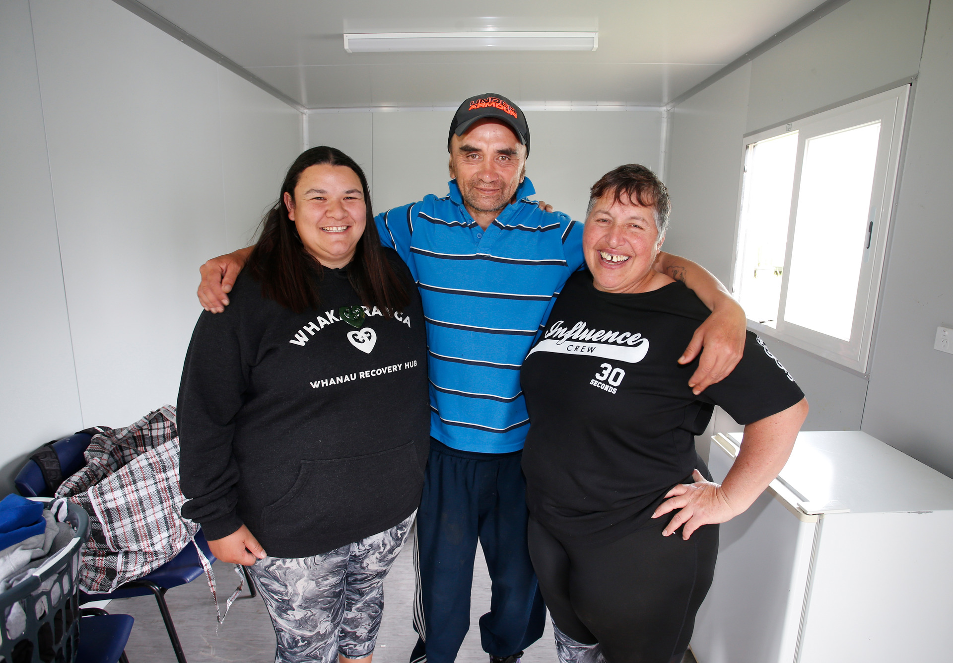 Eric Monk (centre) with Jane Beamsley and Rhonda Zielinski who are helping Northlanders get into their own homes.  Photo / Michael Cunningham