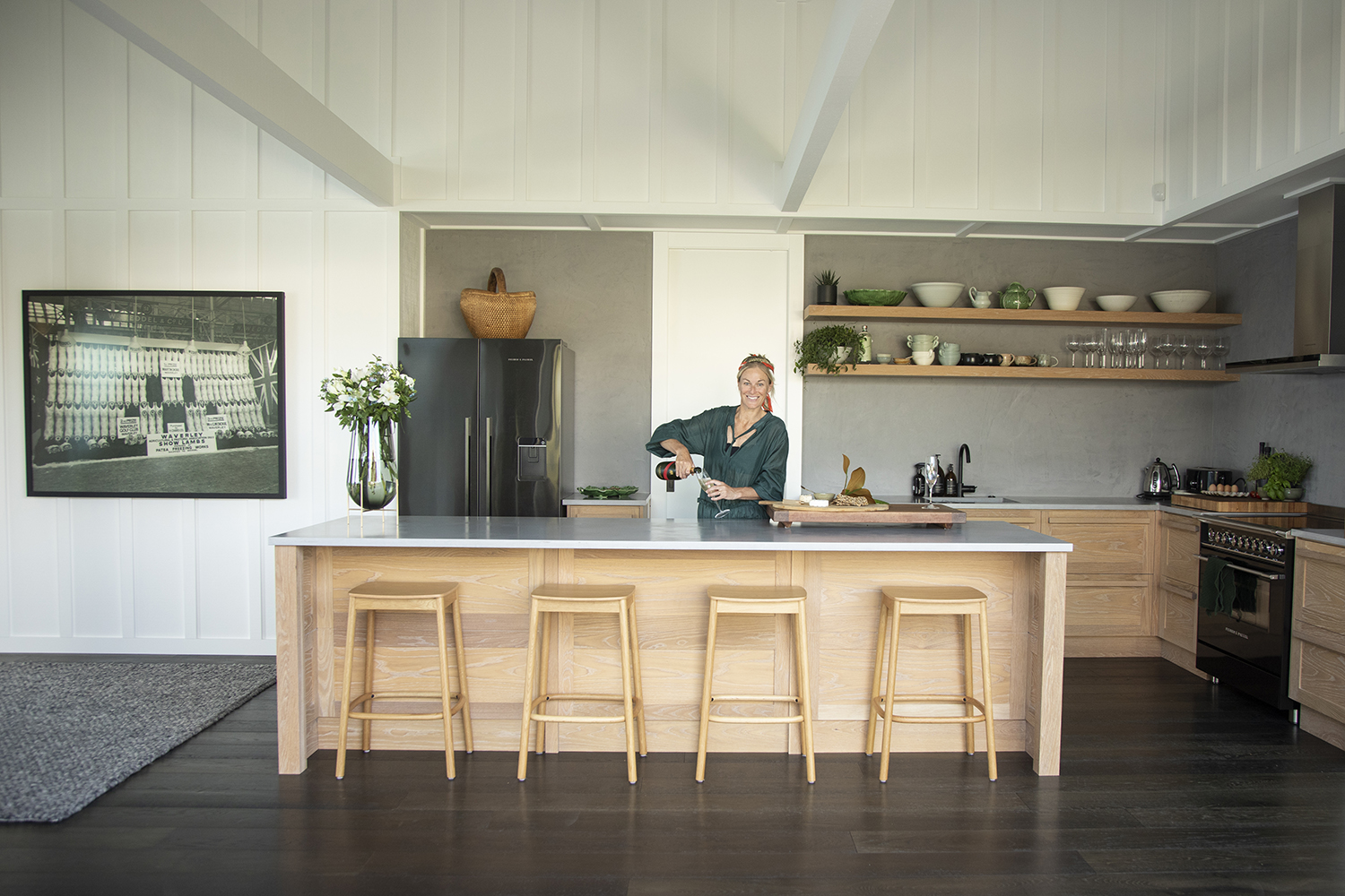 The kitchen features bowls by Kim Morgan and Quirky Pottery, glassware by Broste and chopping boards by Owl. Photo / Ginny Fisher