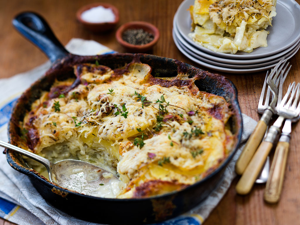 Deluxe potato and kumara gratin. Picture / Babiche Martens.