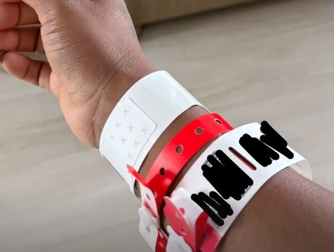 Simone Biles's Instagram post showing her wrist with a number of hospital bracelets. Photo / Simone Biles