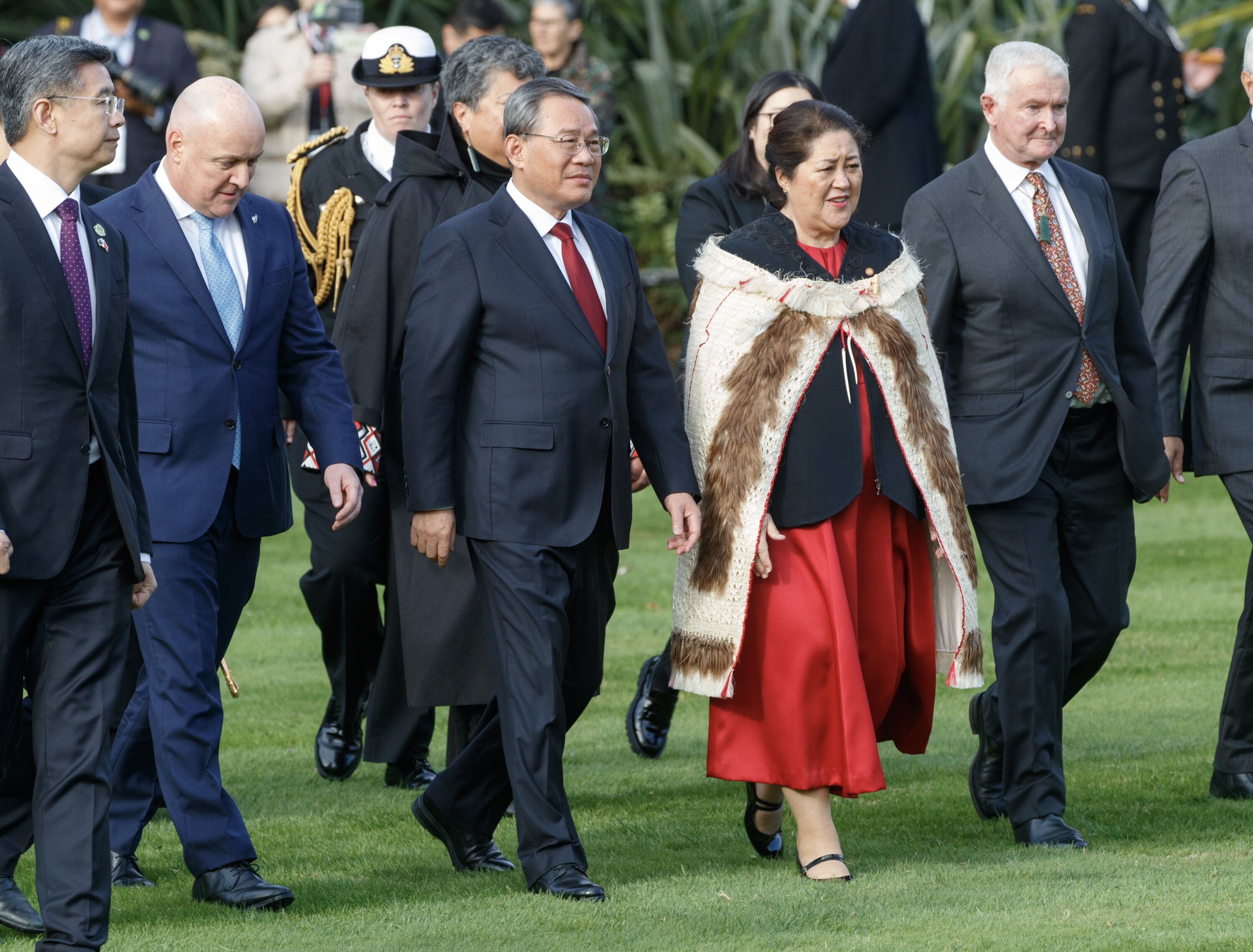 Chinese Premier Li Qiang, flanked by Prime Minister Christopher Luxon and Governor General Dame Cindy Kiro during his official welcome at Government House in Wellington. Photo / Mark Mitchell   