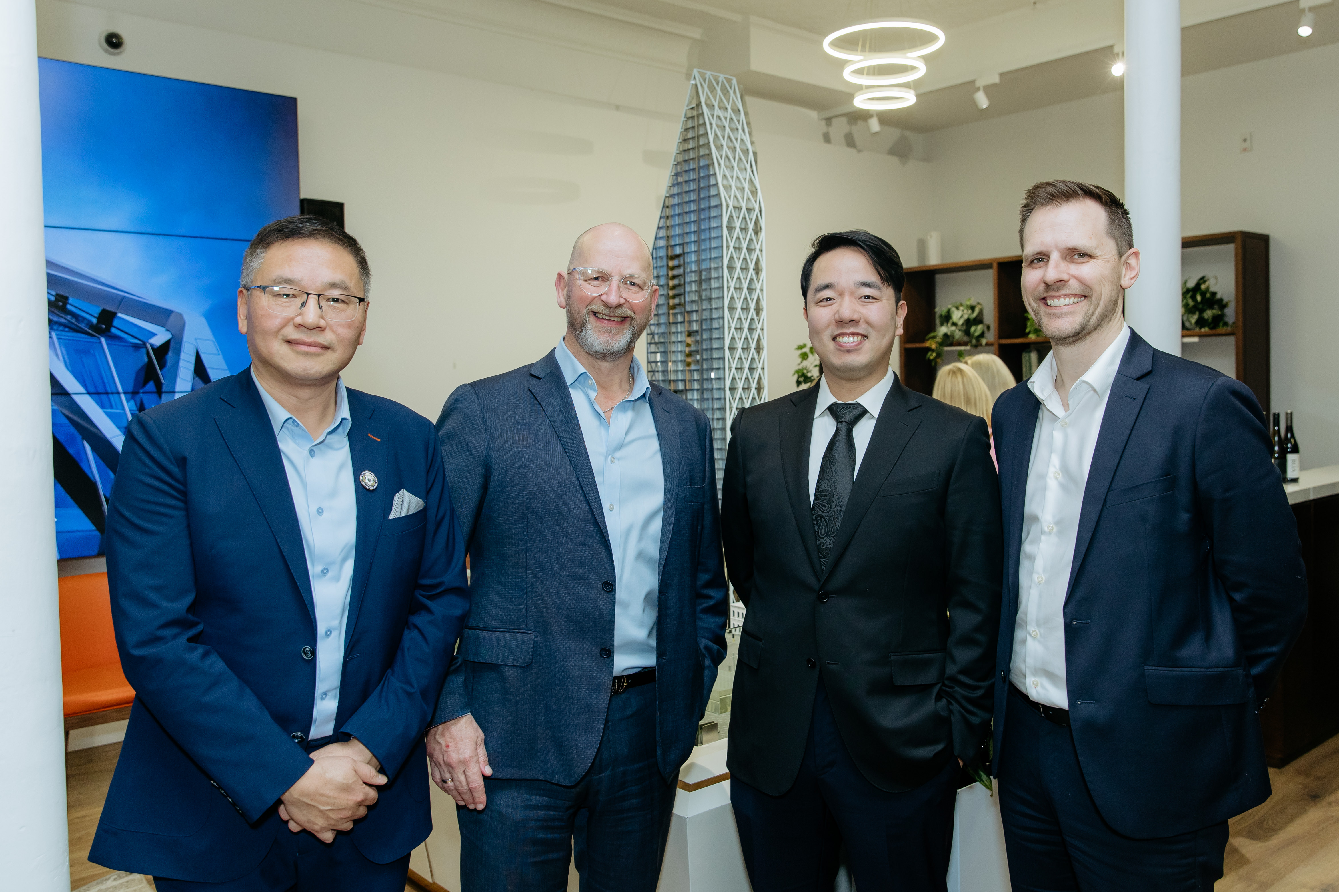 Frank Xu (Shundi Customs), James Sheriff (Icon), Harrison Shao (Shundi) and Dan Bosher (Icon) at an event to market the tower. Photo / Mala Photography