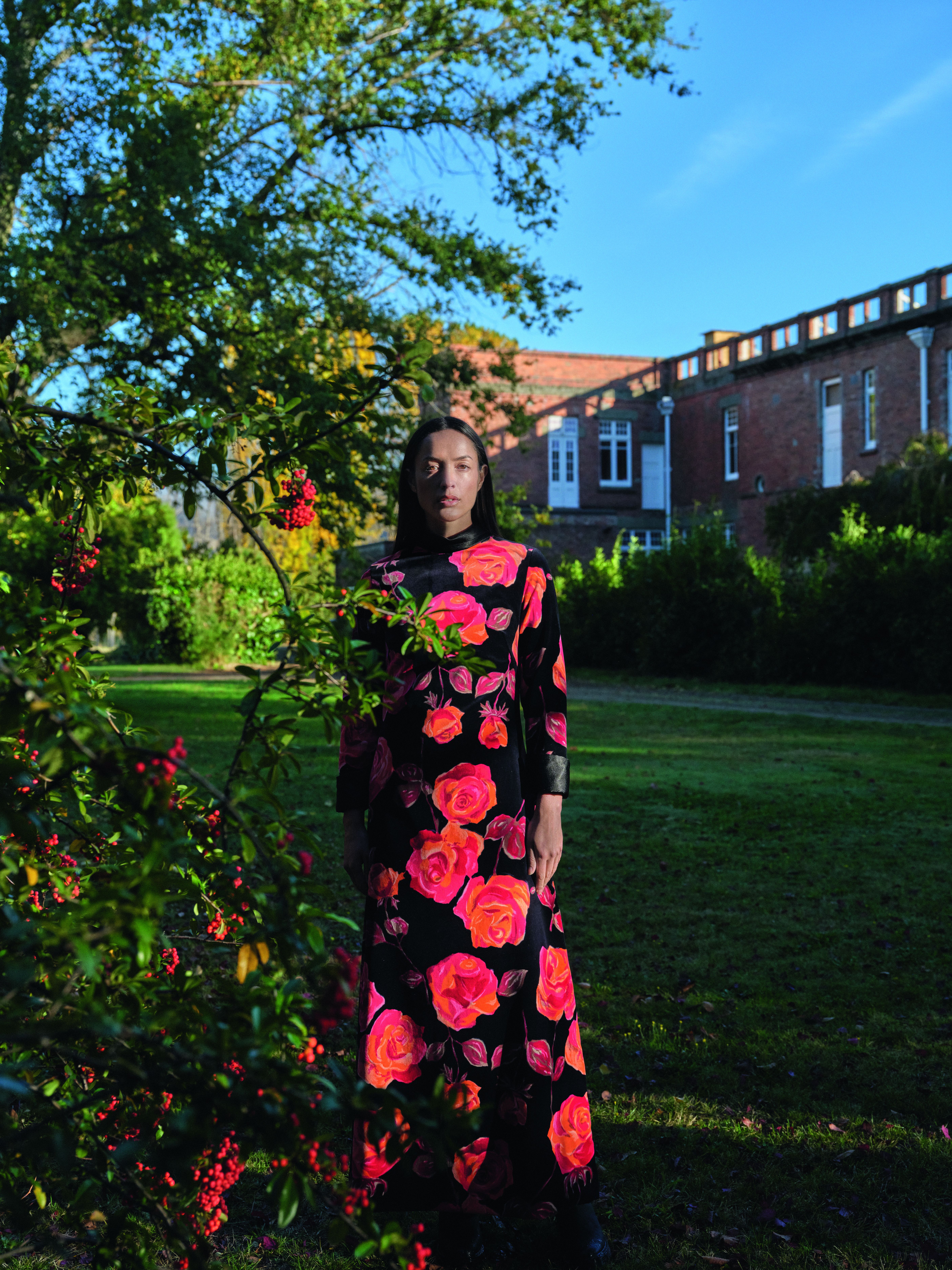 Kevin Berkahn evening dress, early 1970s. Model: Ngahuia Williams, photographed at Earnscleugh Castle, 2024. Photo / © Derek Henderson courtesy of Te Papa Press/Eden Hore Central Otago