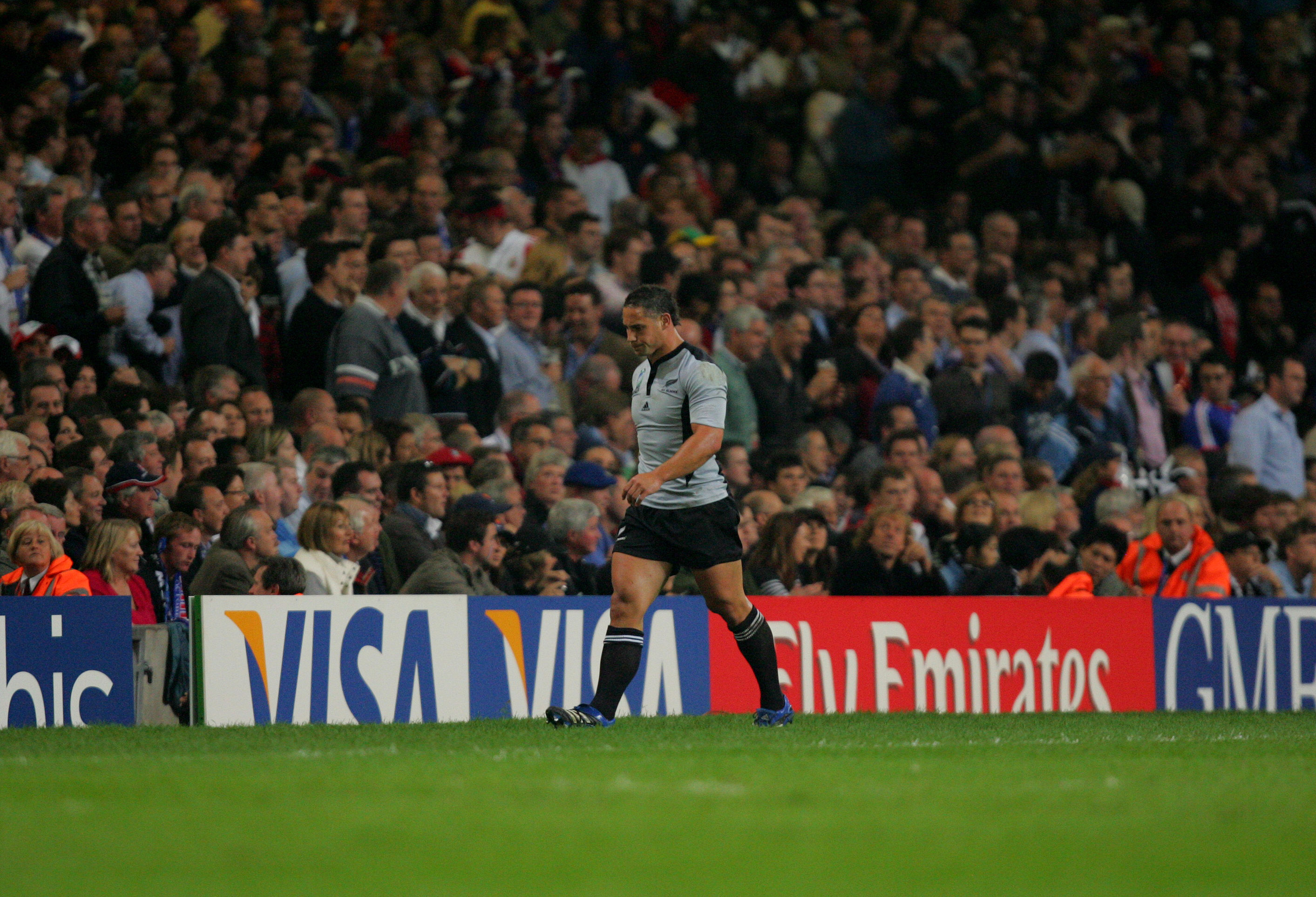 All Black Luke McAlister walks off after being yellow-carded. Photo / Brett Phibbs