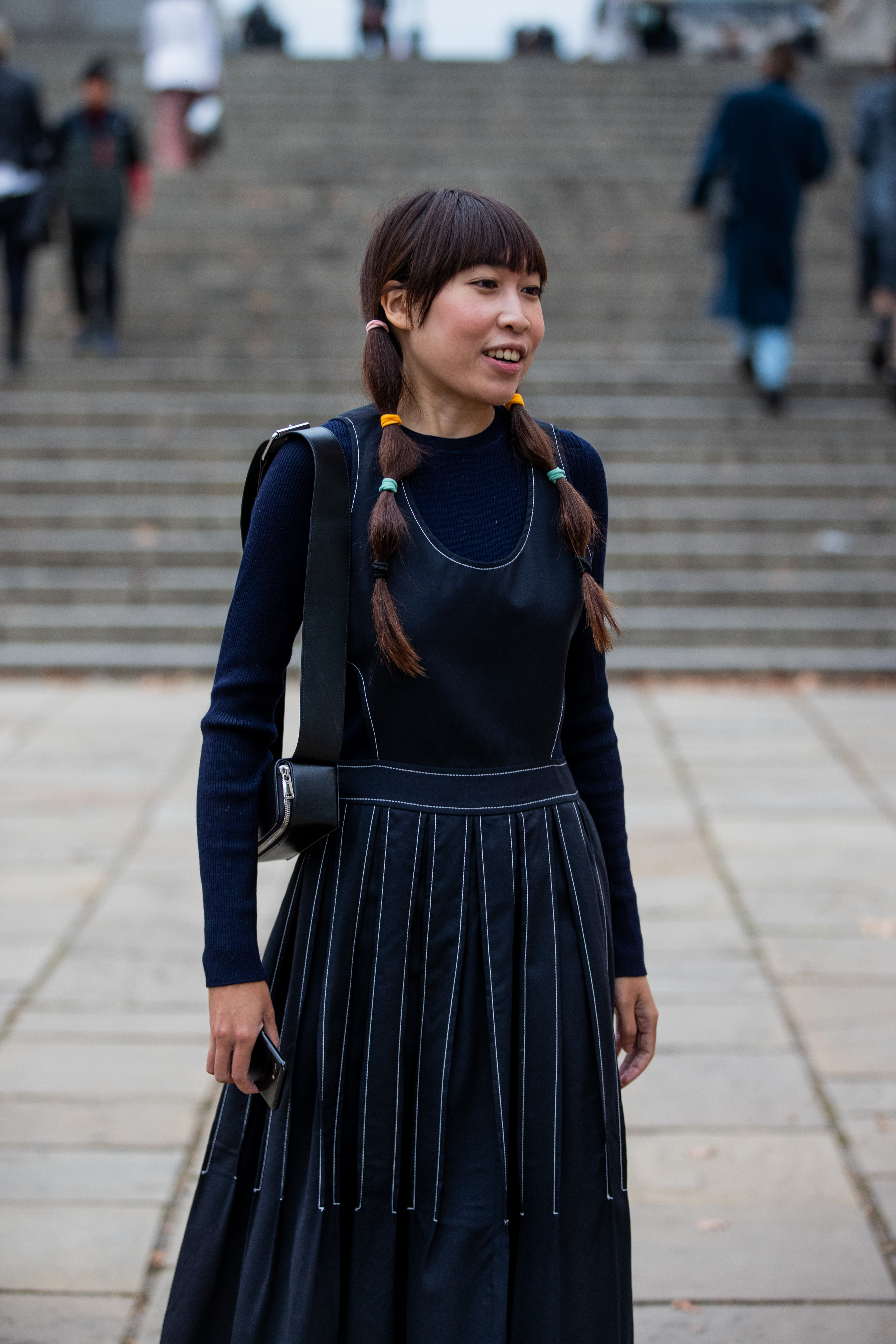 Pinafore dresses come in options suited for a variety of body shapes and are easy-wearing. Photo / Getty Images