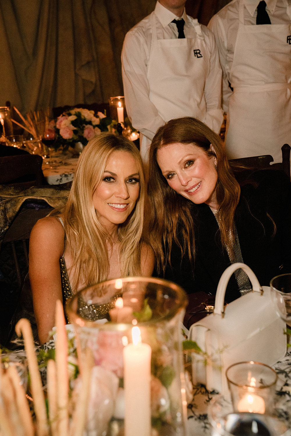 Sheryl Crow and Julianne Moore attend the Ralph Lauren fashion show. Photo / Jane Kim, The New York Times