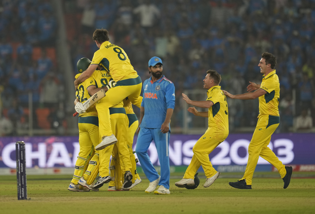 Australia players celebrate after wining against India by 6 wickets during the ICC Men's Cricket World Cup final match in Ahmedabad, India. Photo / AP