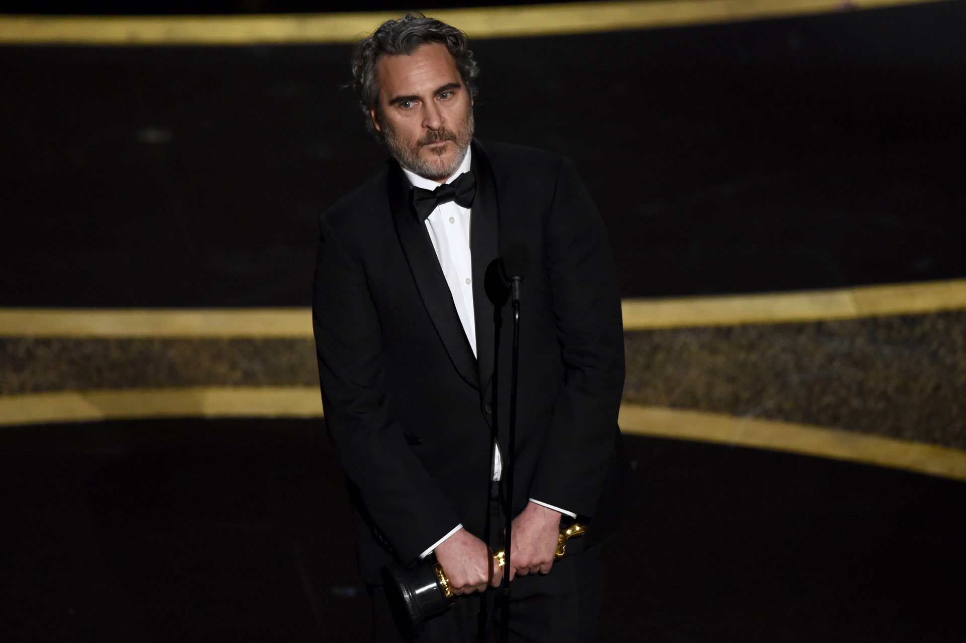 Joaquin Phoenix accepts the award for best performance by an actor in a leading role for Joker. Photo / AP