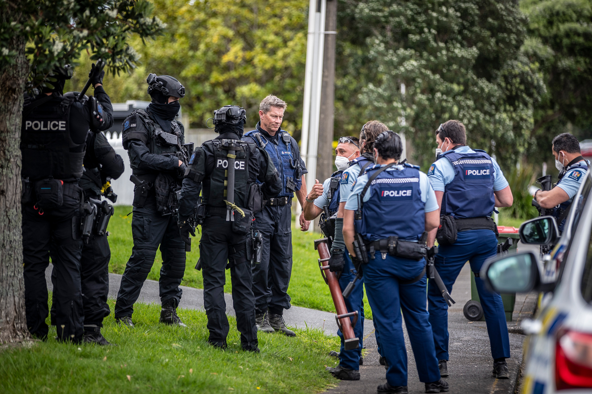 Armed Police in Cliffview Rd, Green Bay, after an earlier homicide near the New Haven Motel in New Lynn. Photo / Michael Craig