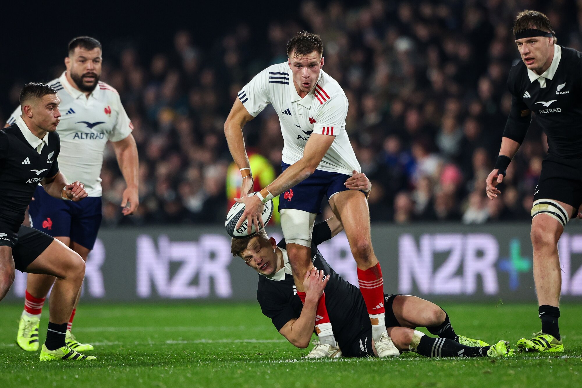 Leo Barre makes a break against the All Blacks in Hamilton. Photo / Photosport