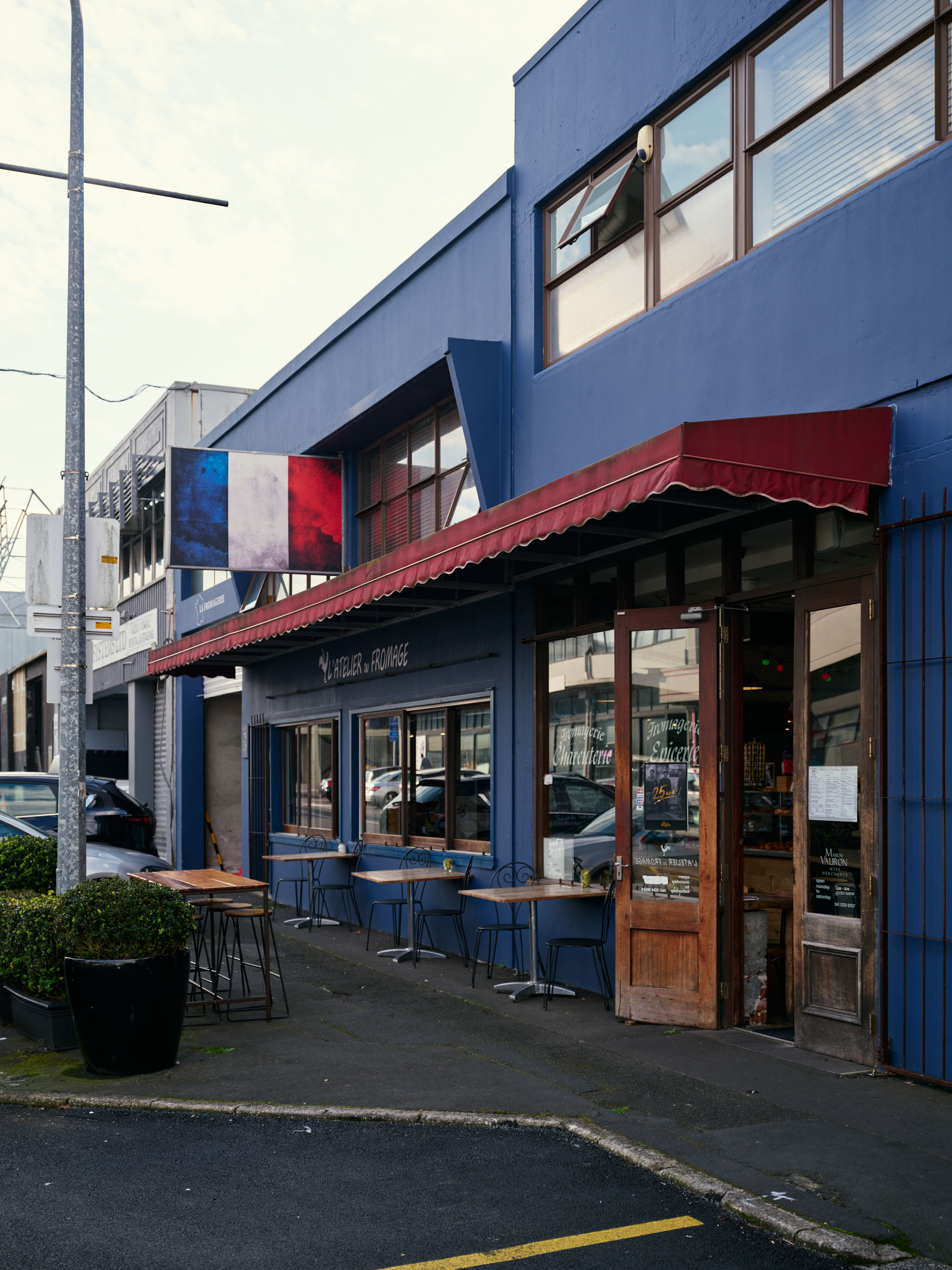 The blue-painted facade of Maison Vauron on Newmarket's McColl St. Photo / Josh Griggs 