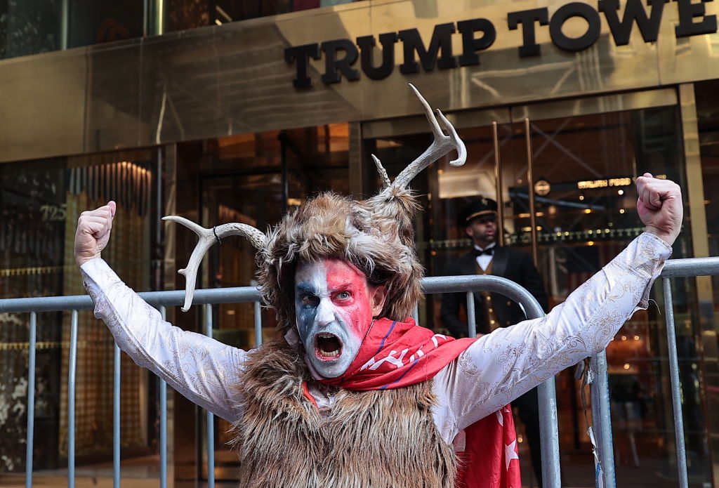 A group of Trump supporters gather in front of Trump Tower days before his court appearance. Photo / Getty