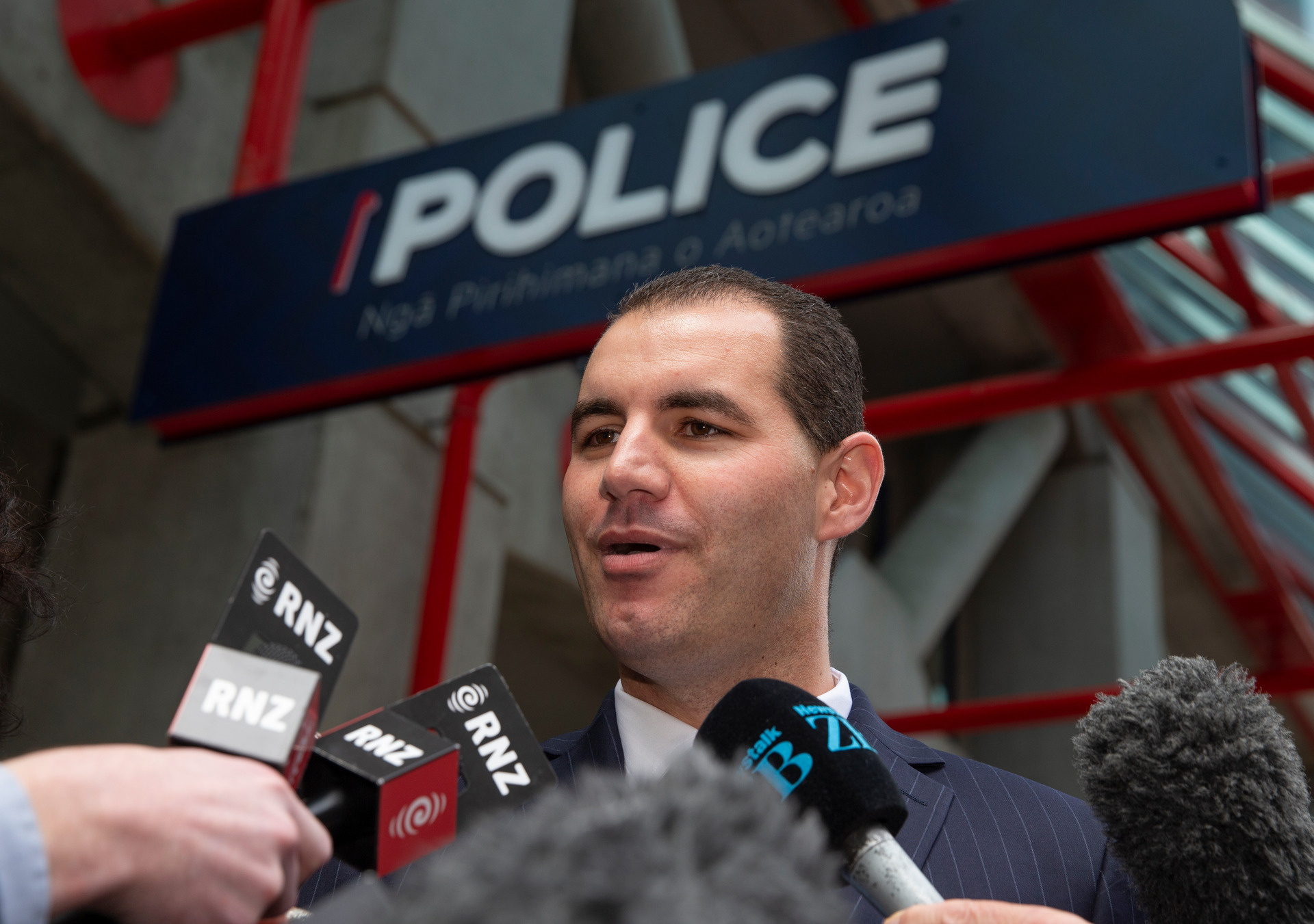 Jami-Lee Ross speaks to media outside the Wellington Central Police Station after he went to police. Photo / Mark Mitchell