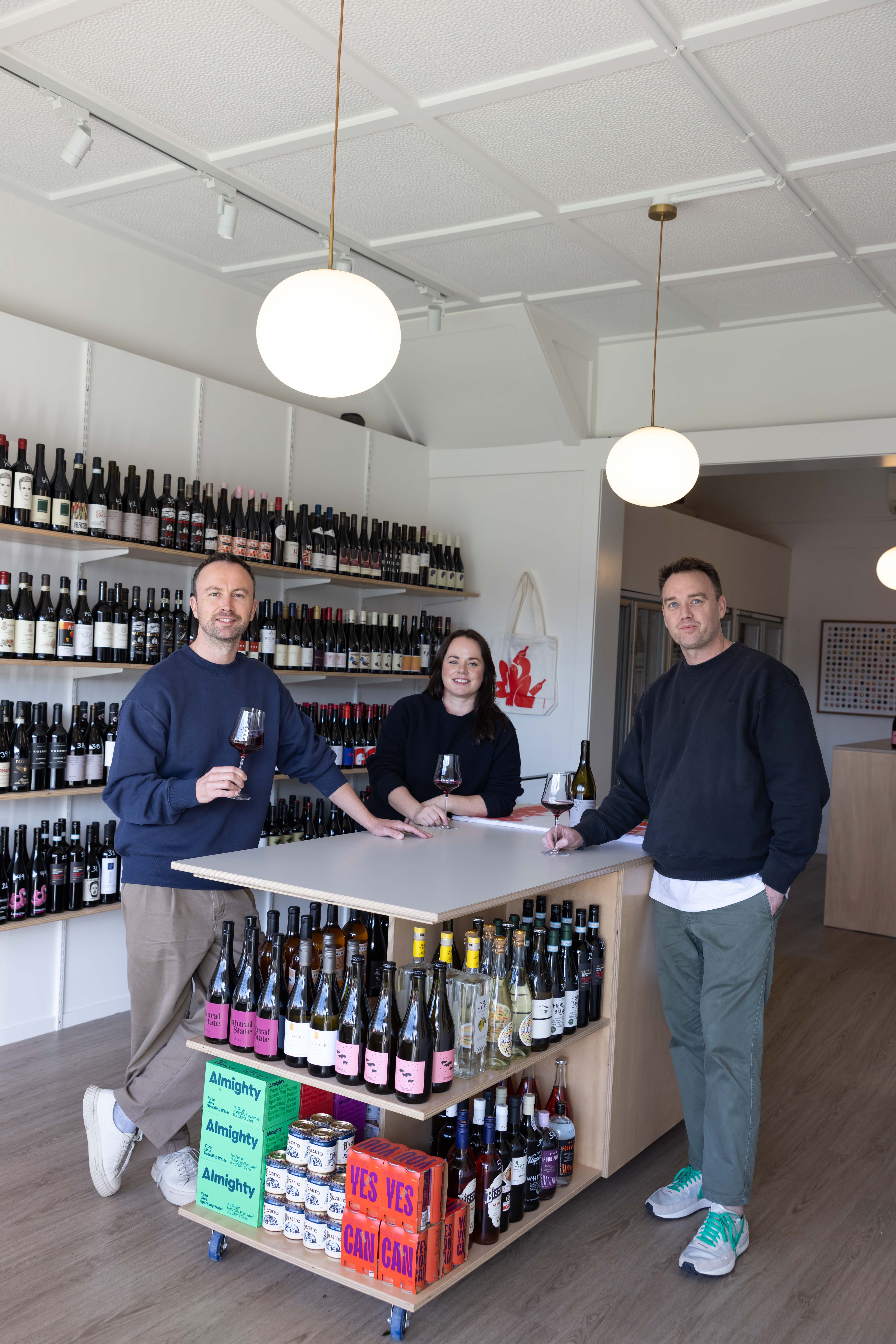 By The Bottle's Pete and John Connell,
and Ashley Roberts. Photo / Supplied