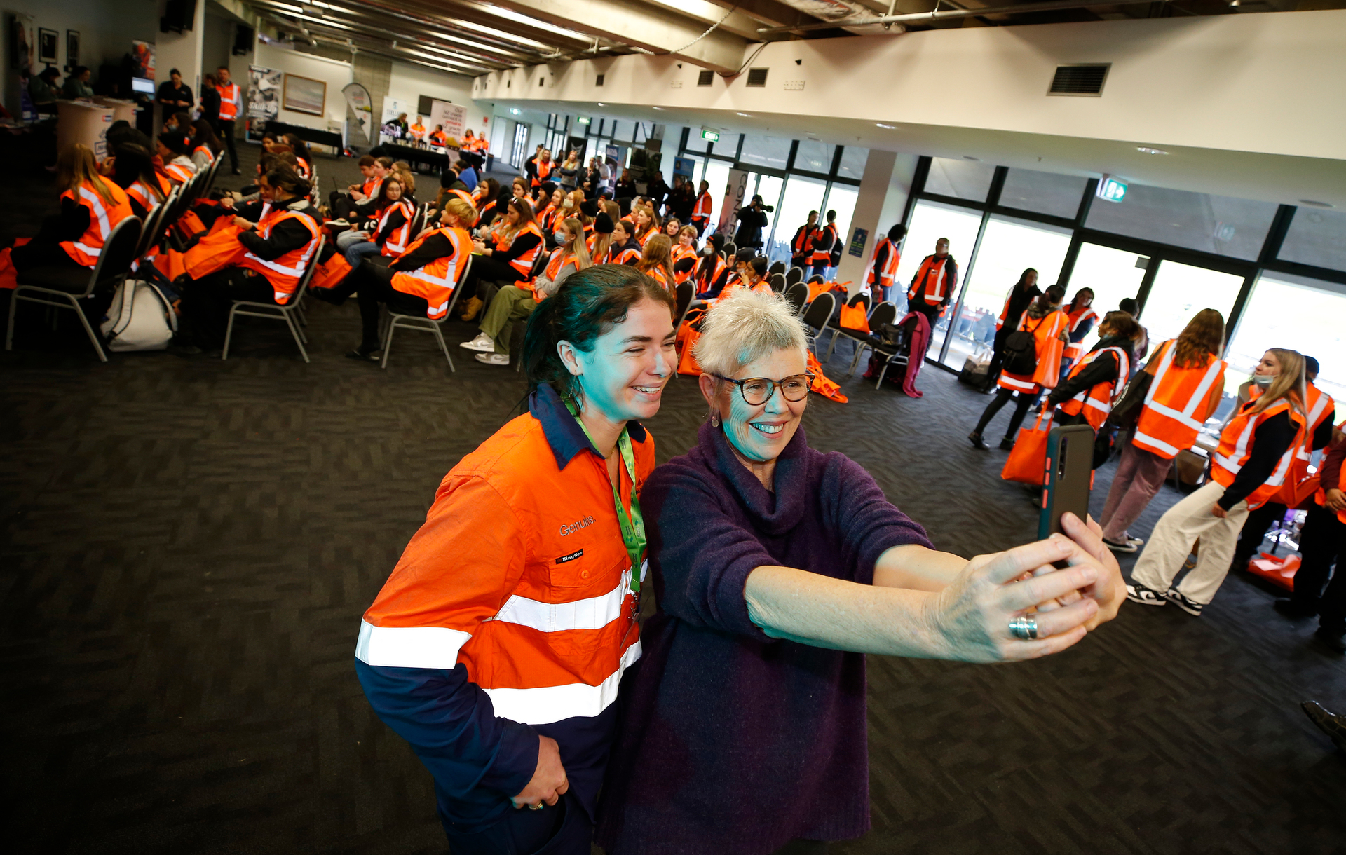 Ciara O'halloran with Whangarei Mayor Sheryl Mai smile for a selfie at the Girls in Infrastructure Event at Semenoff Stadium, Whangārei. Photo / Michael Cunningham