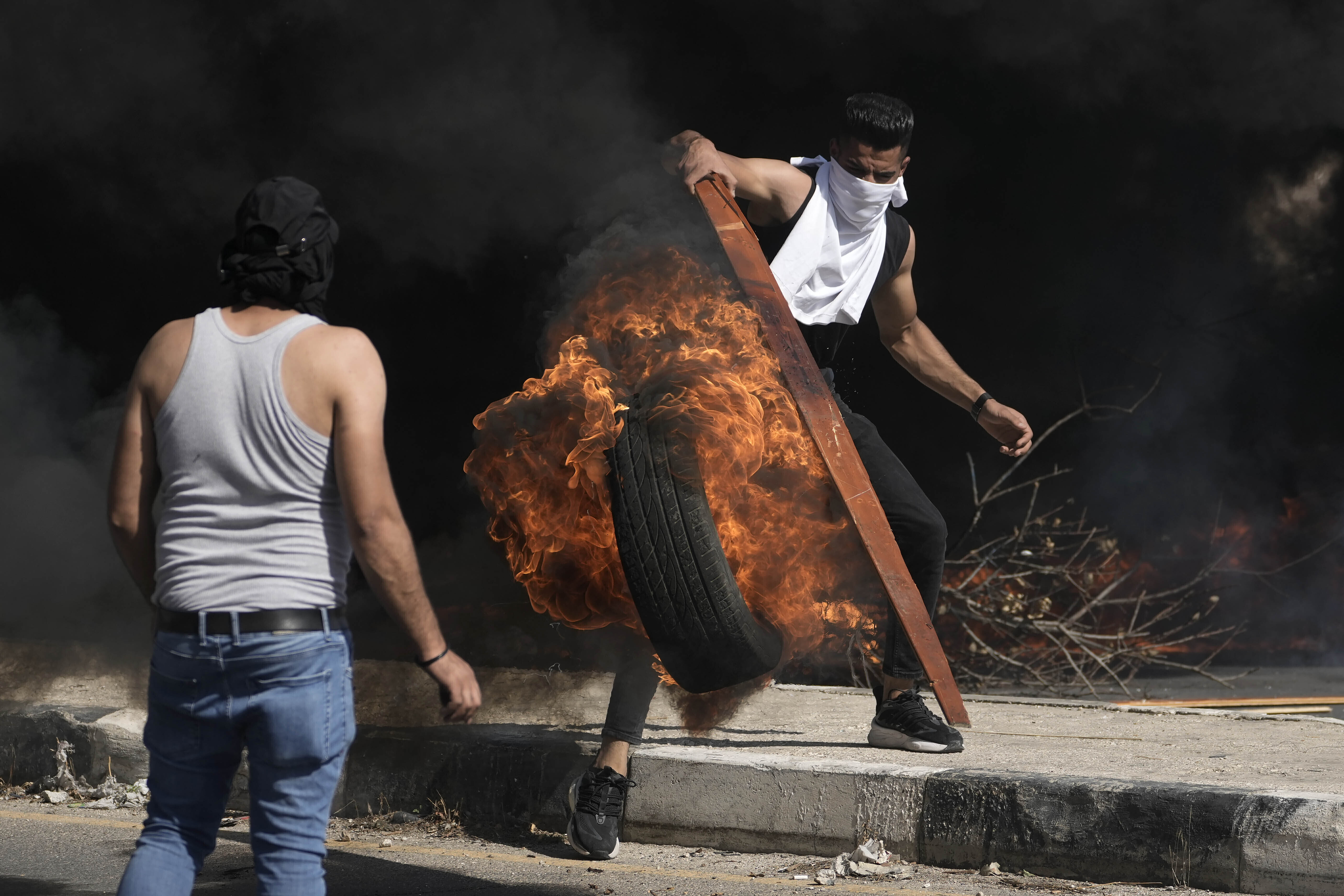 Palestinian demonstrators clash with Israeli forces following a demonstration in support of the Gaza Strip. Photo / AP