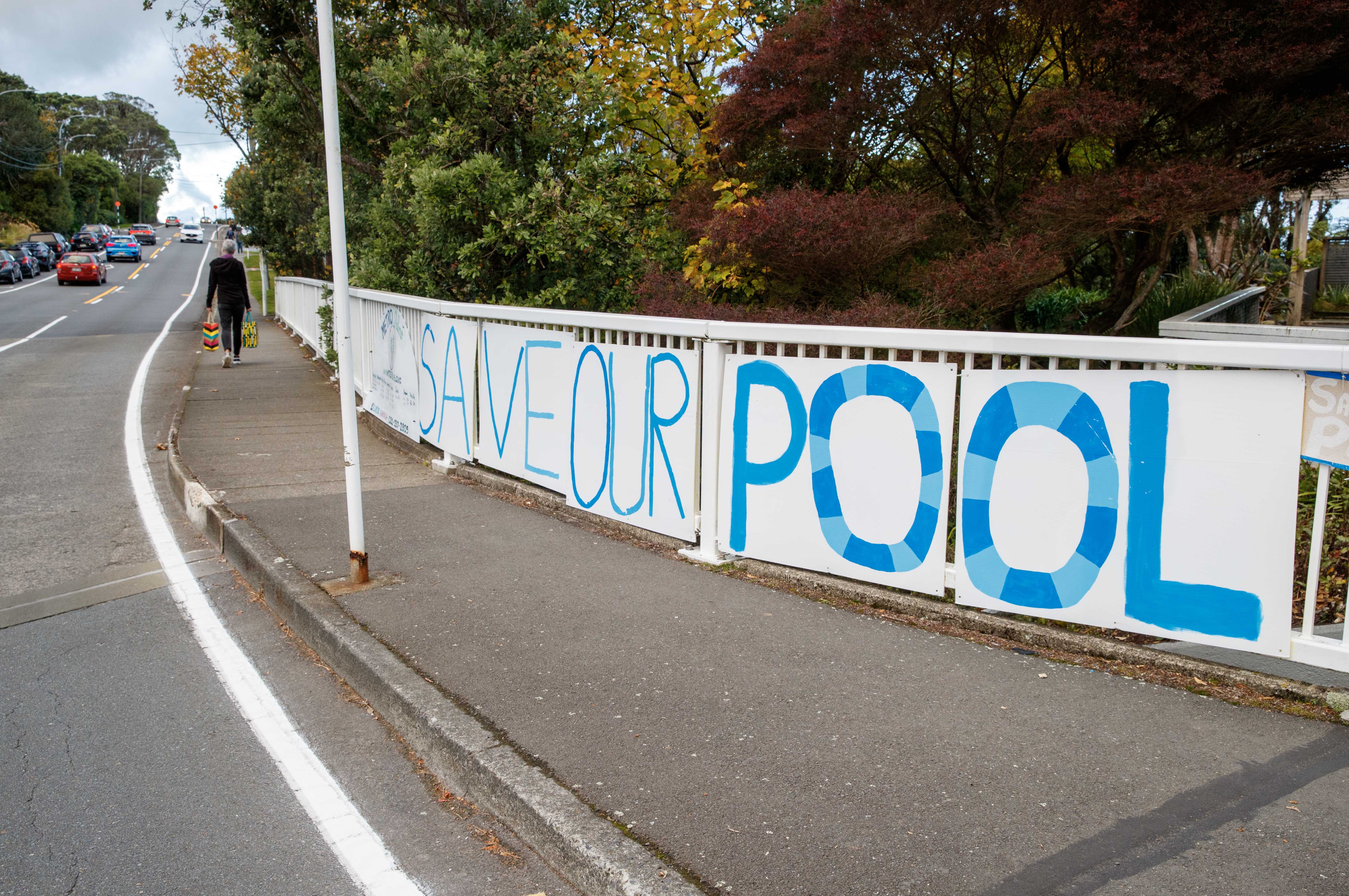 A banner at a roundabout near the pool asks the council to save the facility. Photo / Mark Mitchell  